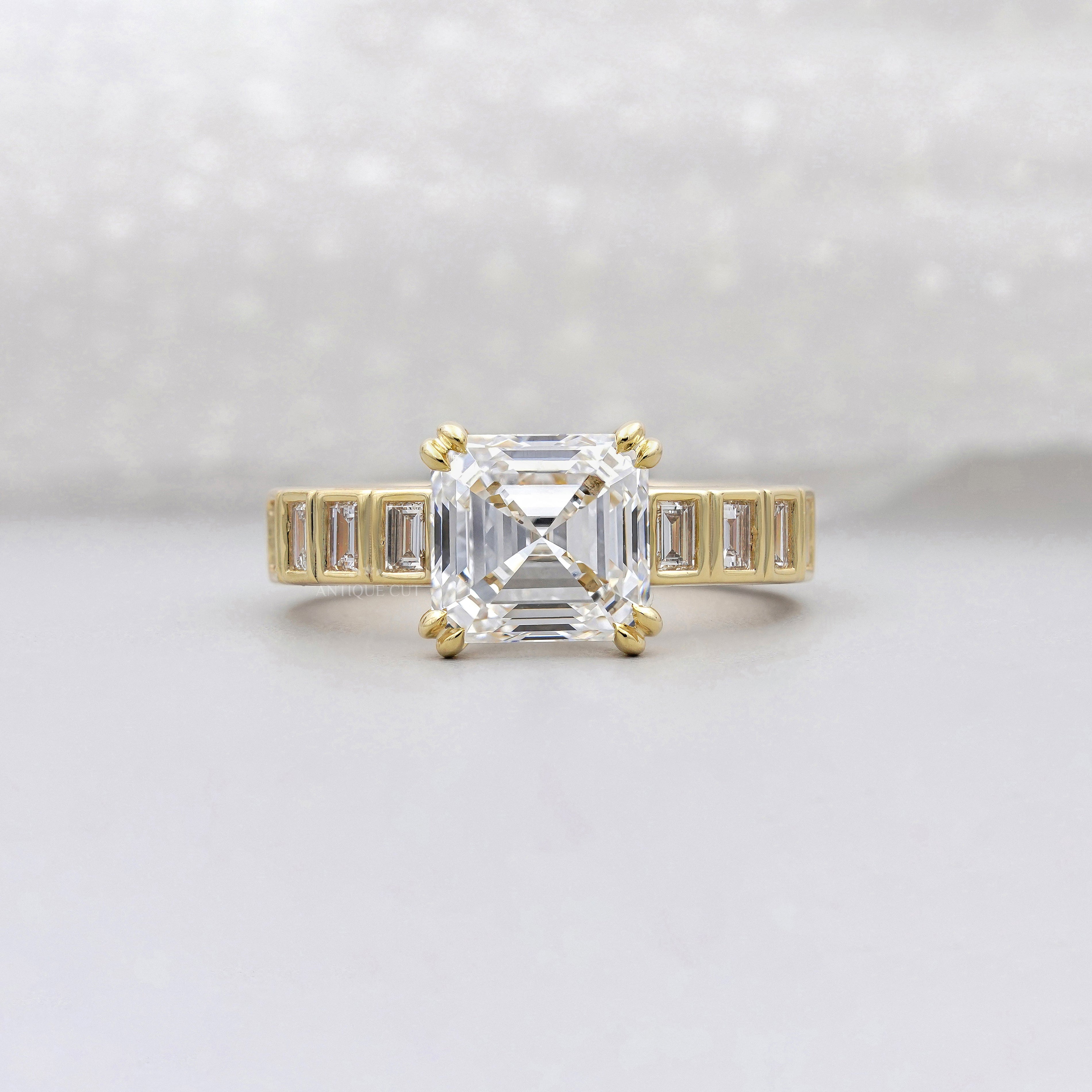 Asscher Cut 5.50tcw Lab Grown Diamond Engagement Ring | Yellow Gold Channel Set | IGI Certified