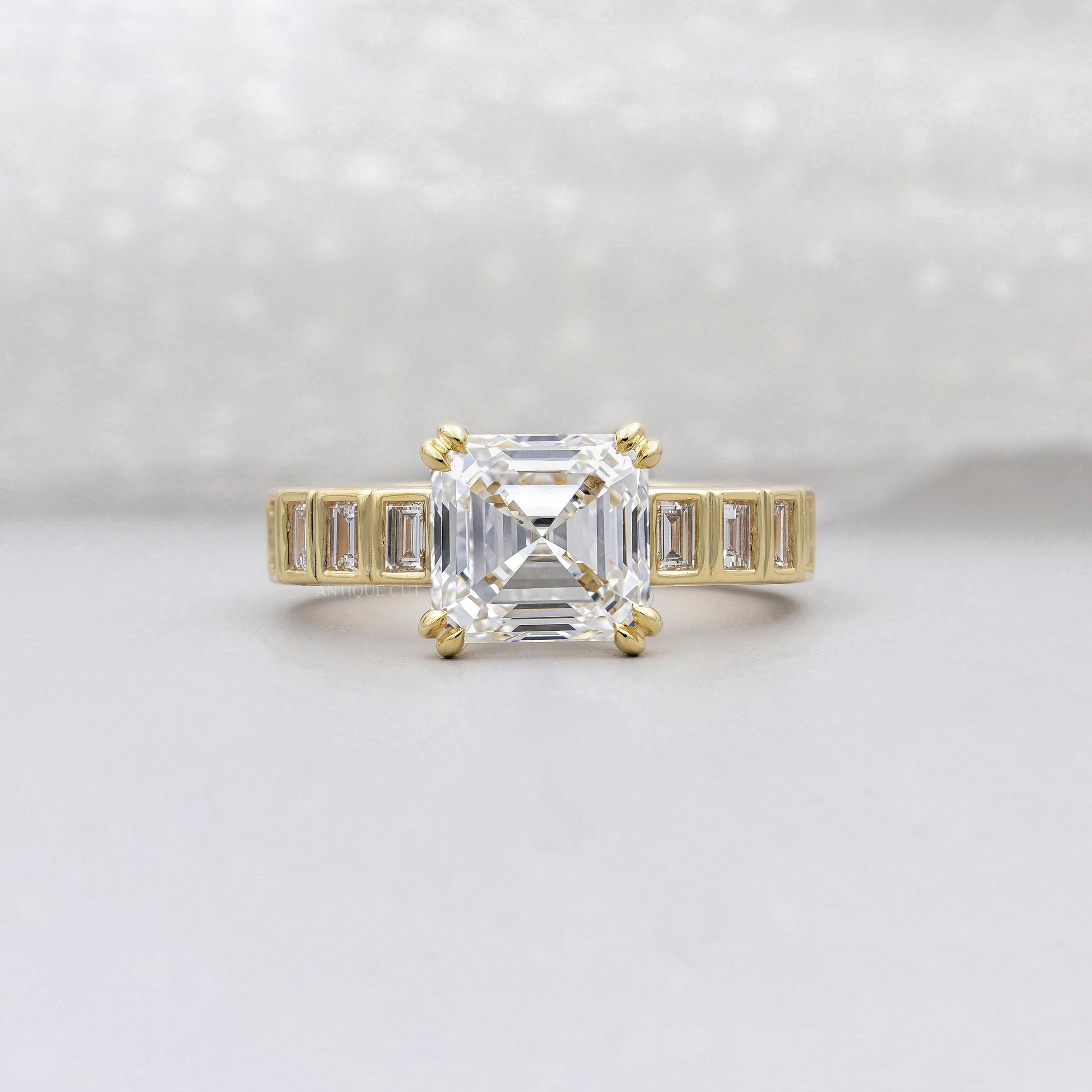 Asscher Cut 5.50tcw Lab Grown Diamond Engagement Ring | Yellow Gold Channel Set | IGI Certified