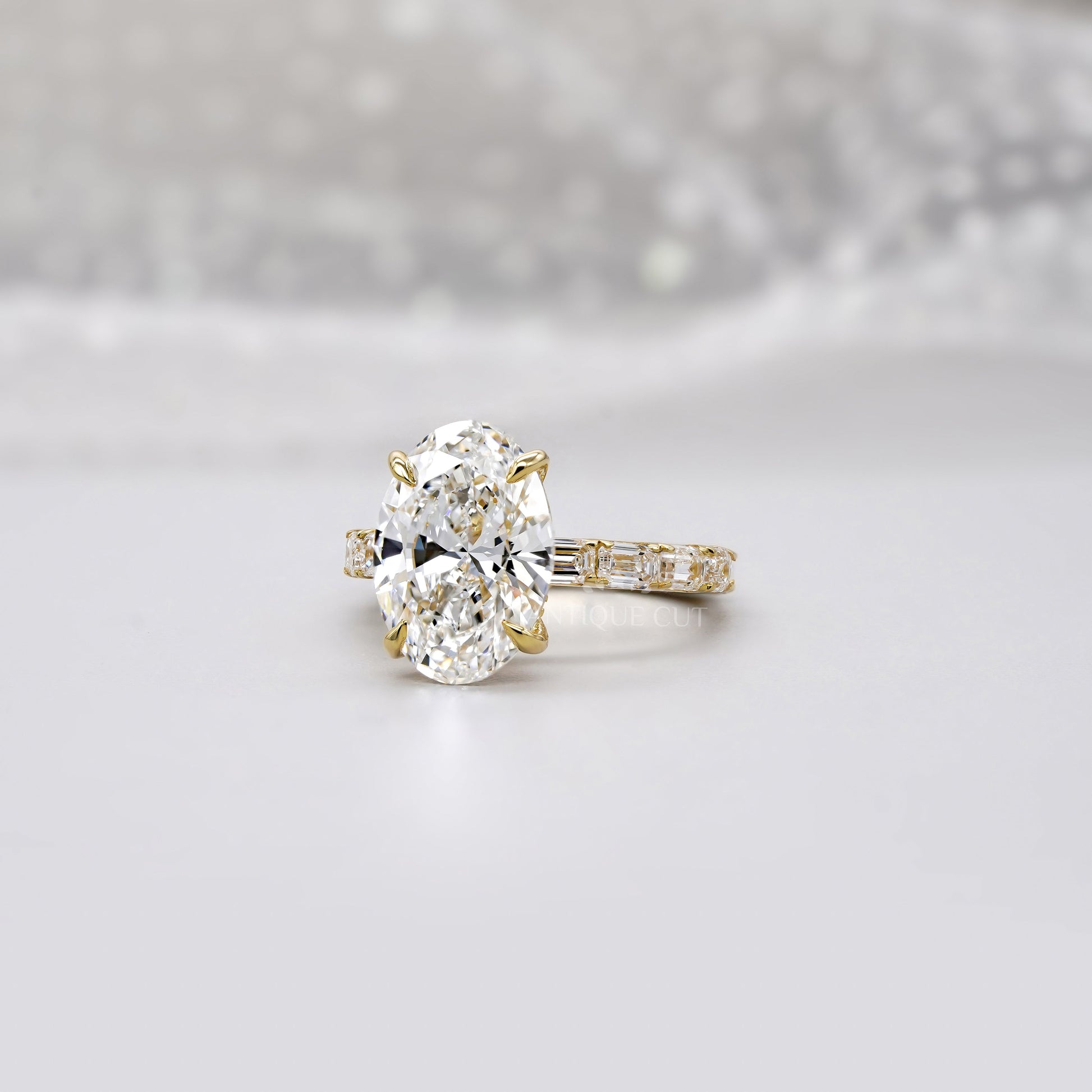 Oval 4.30tcw Lab Diamond Ring | Emerald & Round Side Stones | Yellow Gold | IGI Certified