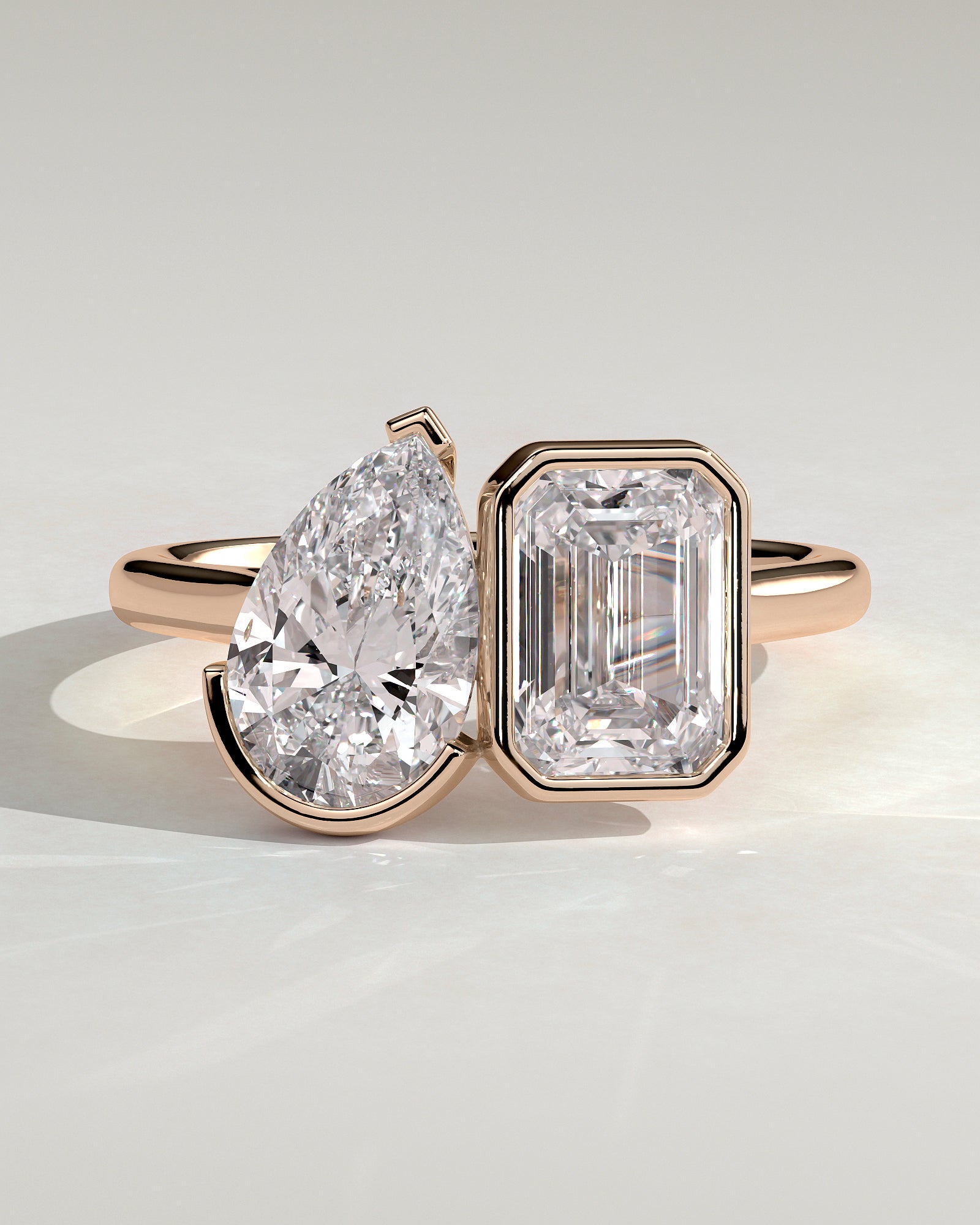 Rose :: Calvellae 3.3ct pear and 3.3ct emerald bezel toi et moi lab grown diamond engagement ring IGI certified rose gold