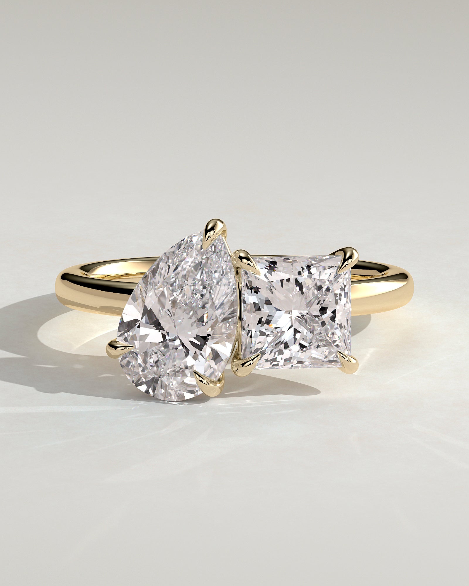Yellow :: Velserae pear and princess toi et moi lab grown diamond engagement ring IGI certified yellow gold