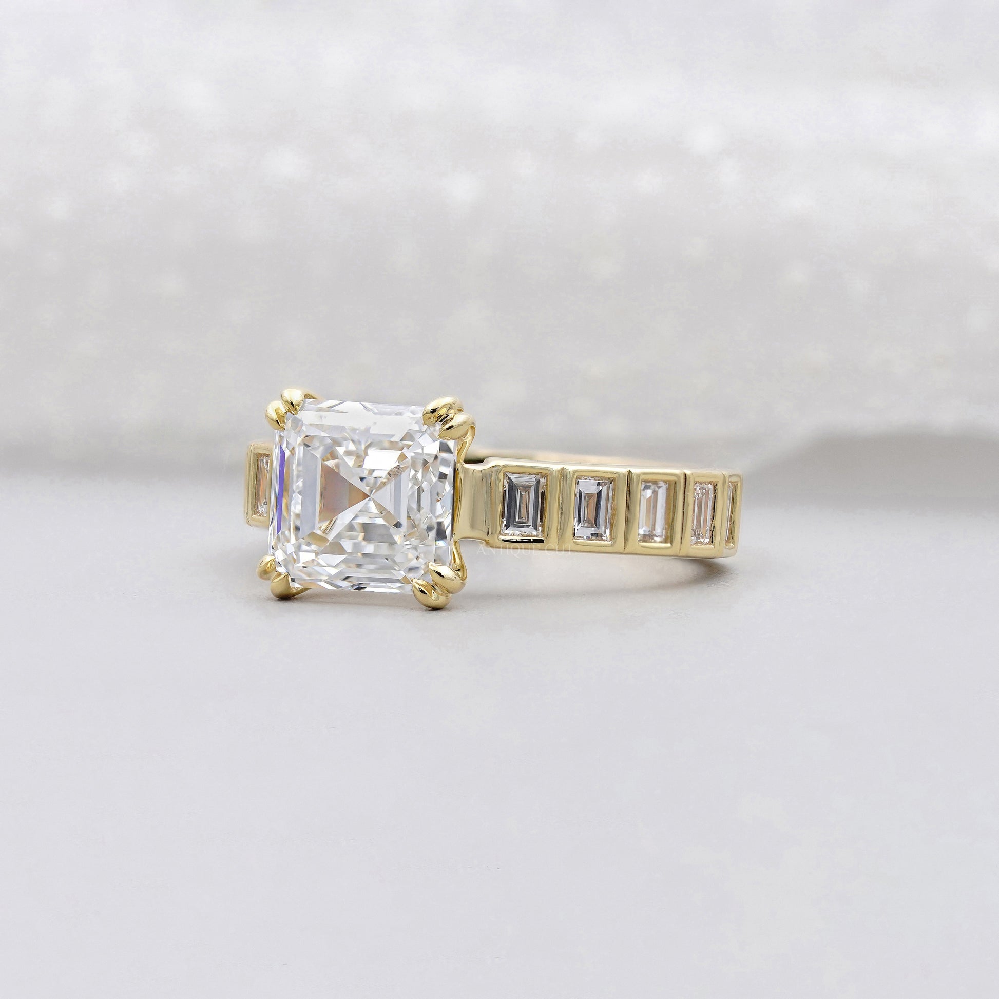 Asscher Cut 5.50tcw Lab Grown Diamond Engagement Ring | Yellow Gold Channel Set | IGI Certified