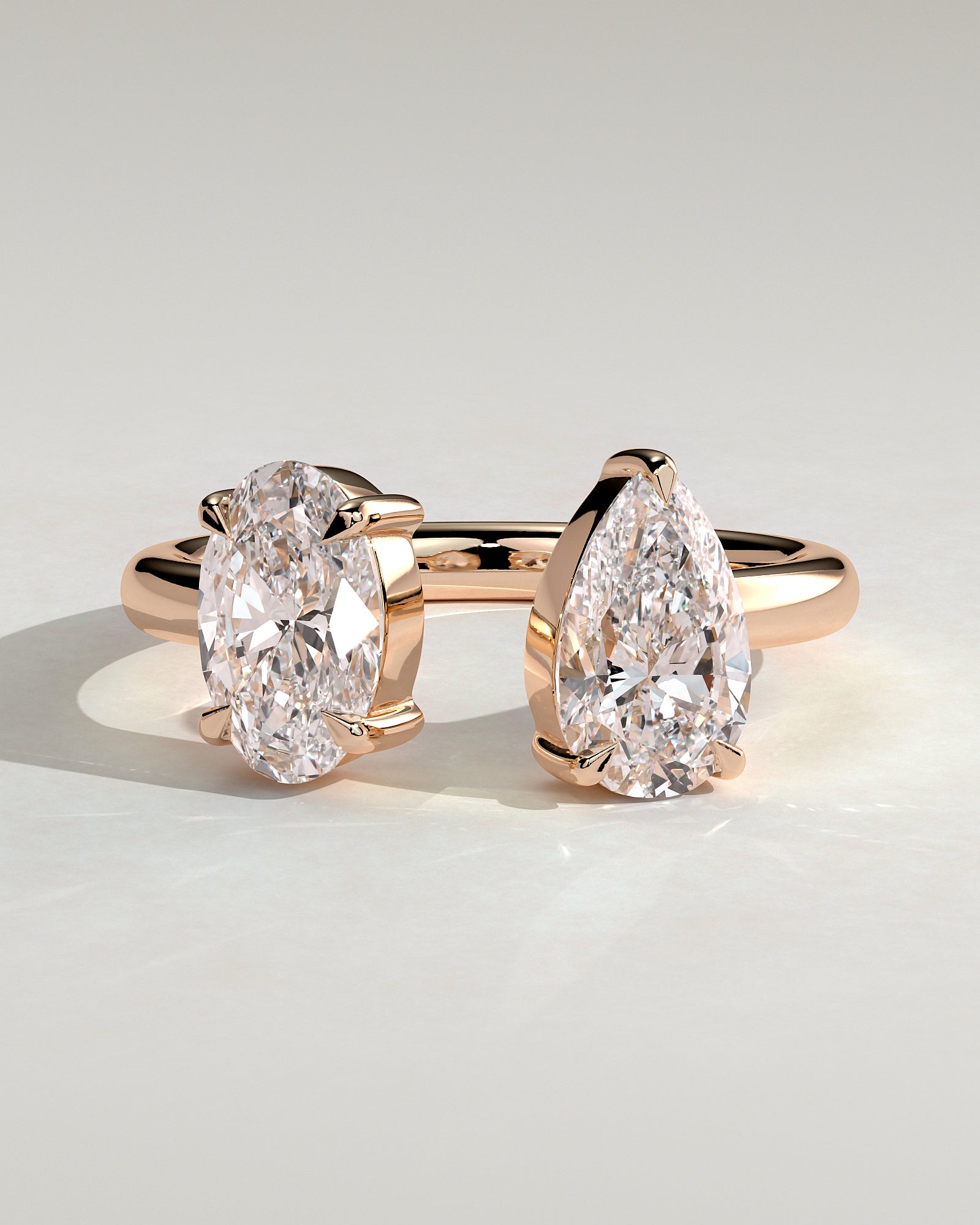 Rose :: Noriquea oval and pear toi et moi lab grown diamond engagement ring IGI certified rose gold