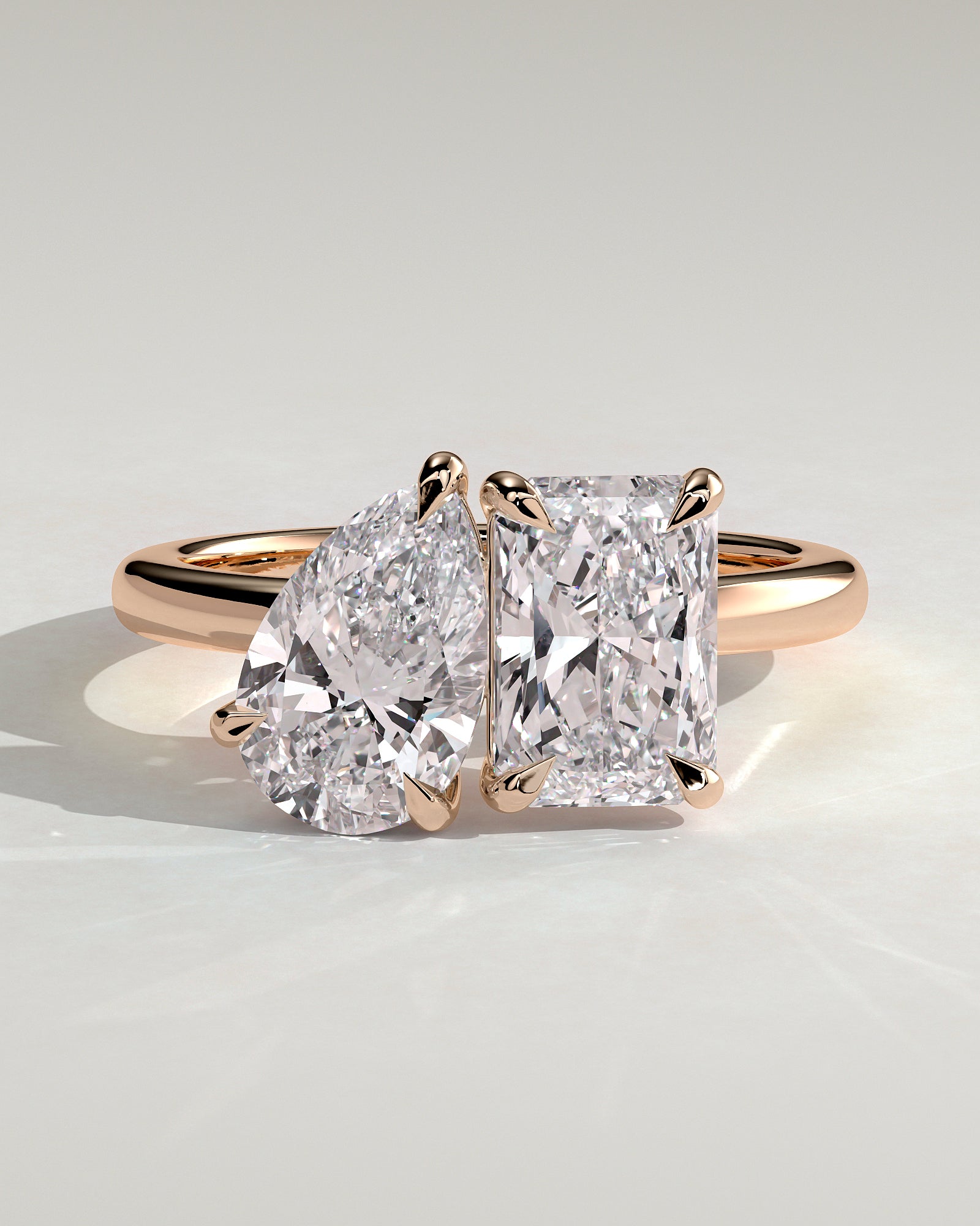 Rose :: Arviquea 1.5ct pear and 1.8ct radiant toi et moi lab grown diamond engagement ring IGI certified rose gold
