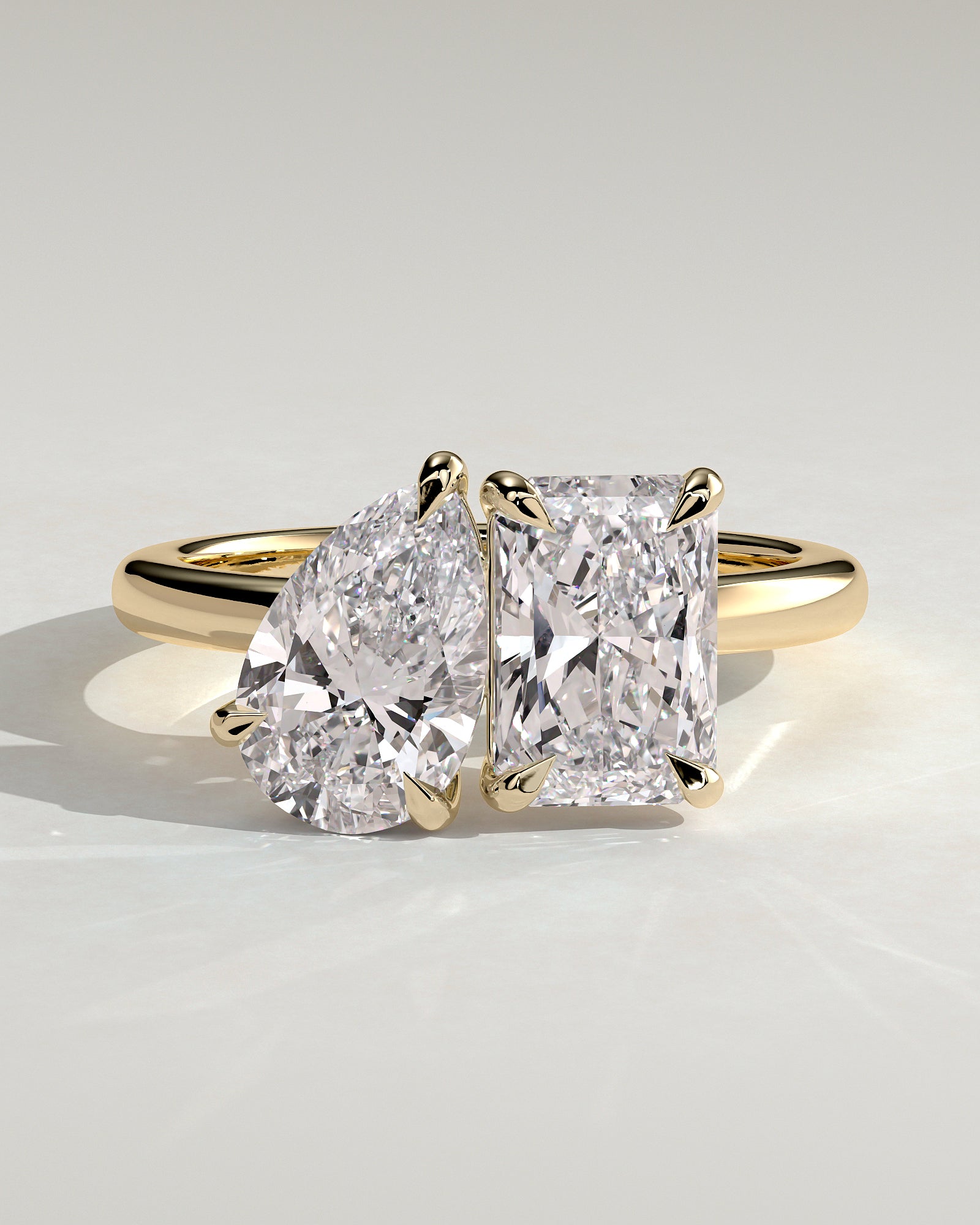 Yellow :: Arviquea 1.5ct pear and 1.8ct radiant toi et moi lab grown diamond engagement ring IGI certified yellow gold