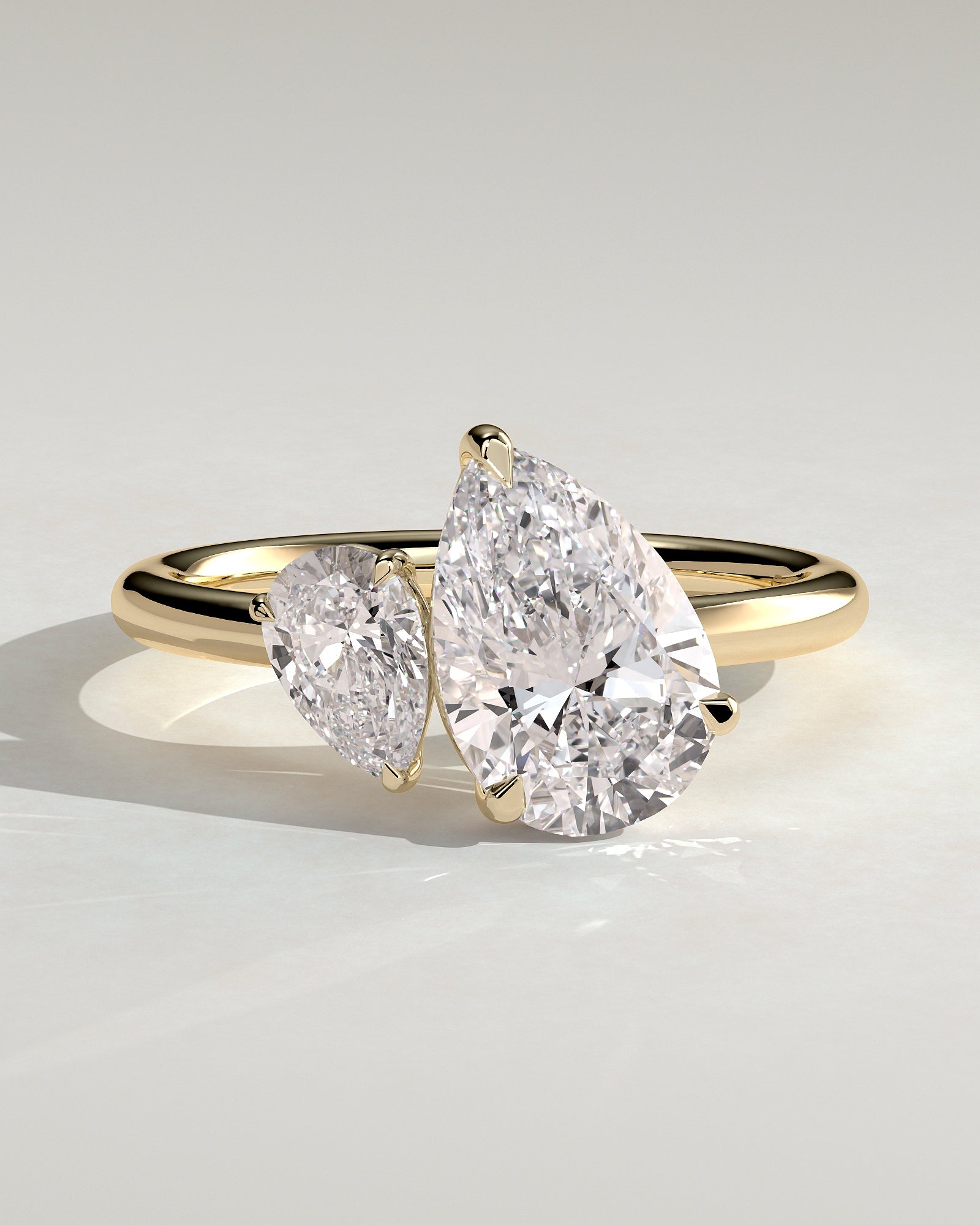 Yellow :: Serentique 0.5ct and 1.25ct pear toi et moi lab grown diamond engagement ring IGI certified yellow gold