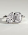 White :: Calvellae 3.3ct pear and 3.3ct emerald bezel toi et moi lab grown diamond engagement ring 360 view white gold IGI certified two stone ring