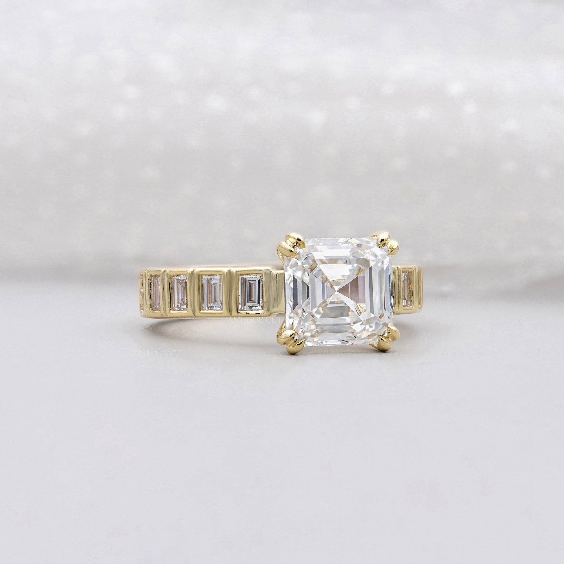 Asscher Cut 5.50tcw Lab Grown Diamond Engagement Ring | Yellow Gold Channel Set | IGI Certified