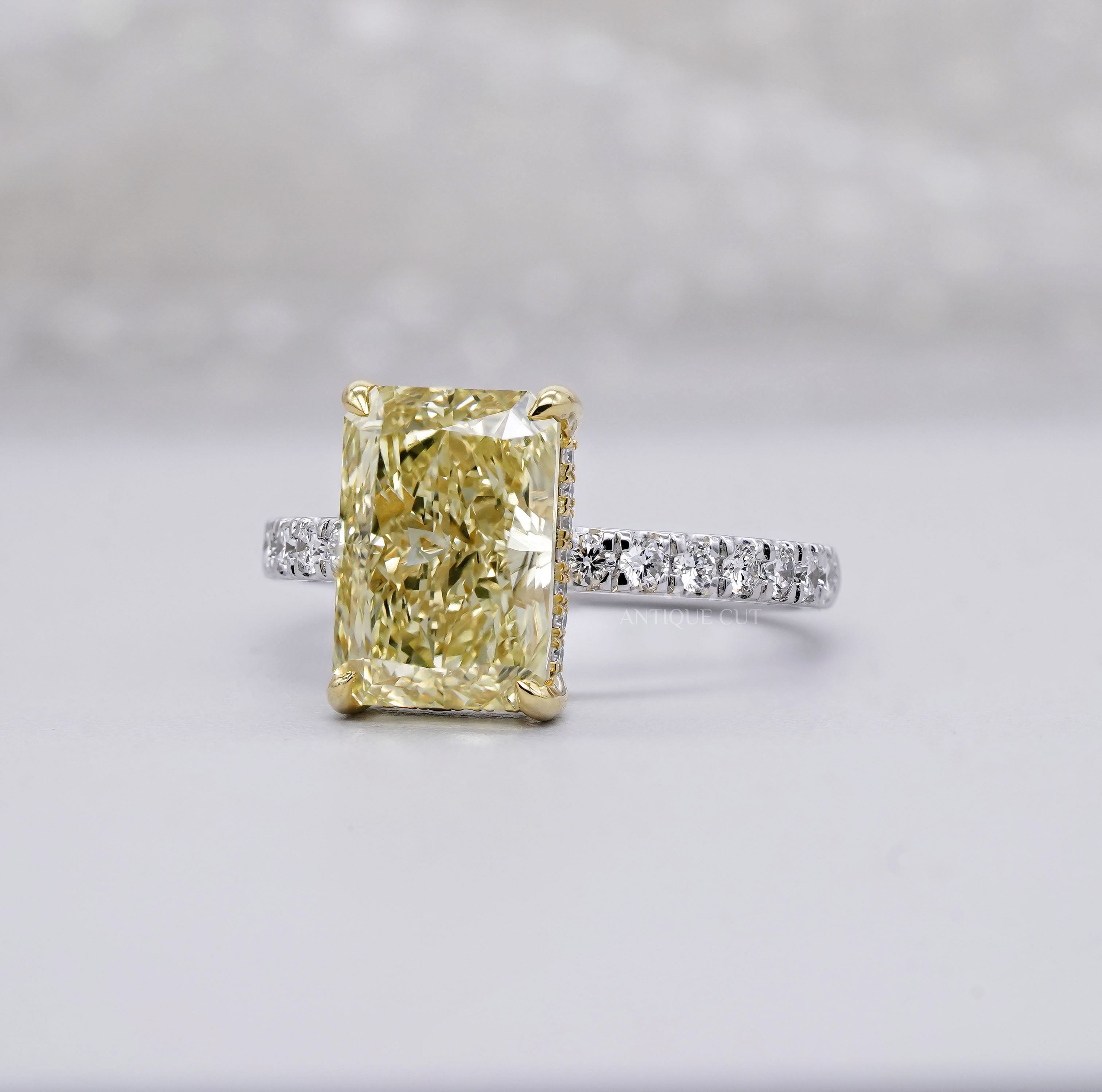 4.40ct Radiant Fancy Yellow Lab Diamond Ring with Hidden Halo & Two Tone Pavé Band