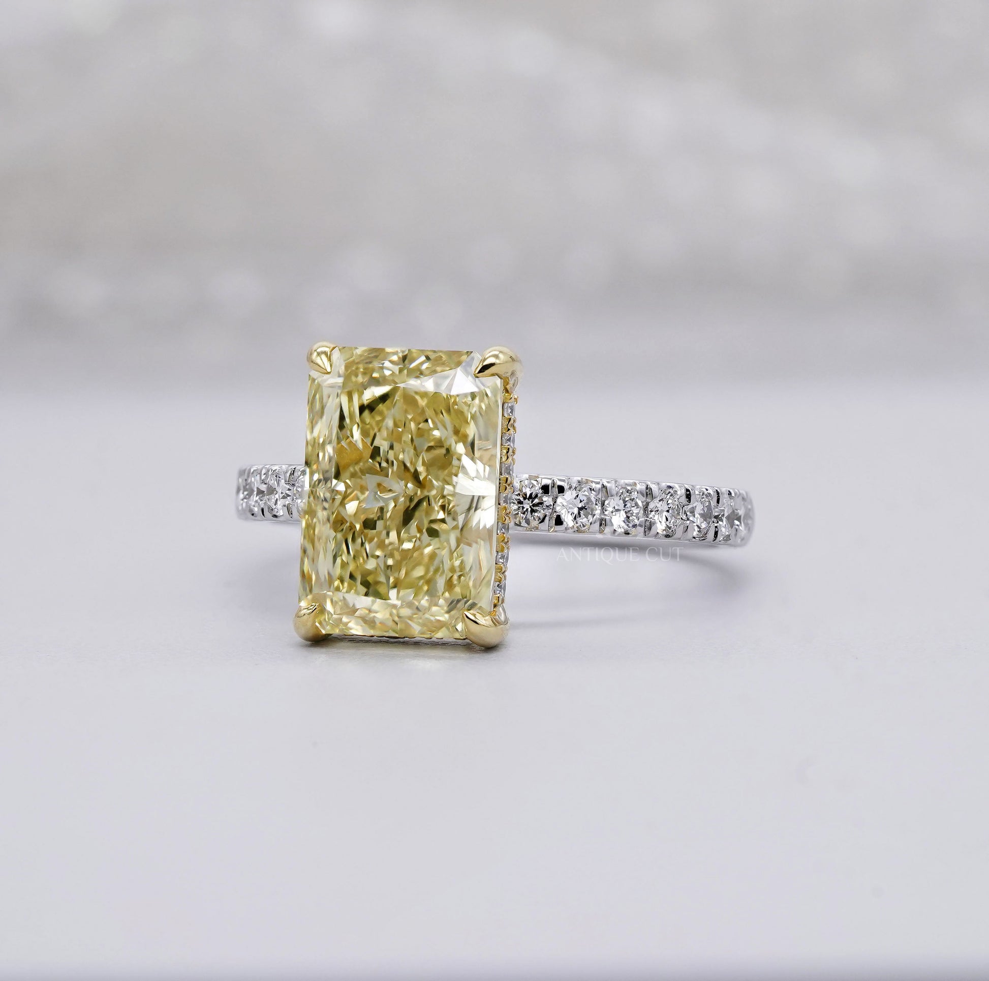4.40ct Radiant Fancy Yellow Lab Diamond Ring with Hidden Halo & Two Tone Pavé Band