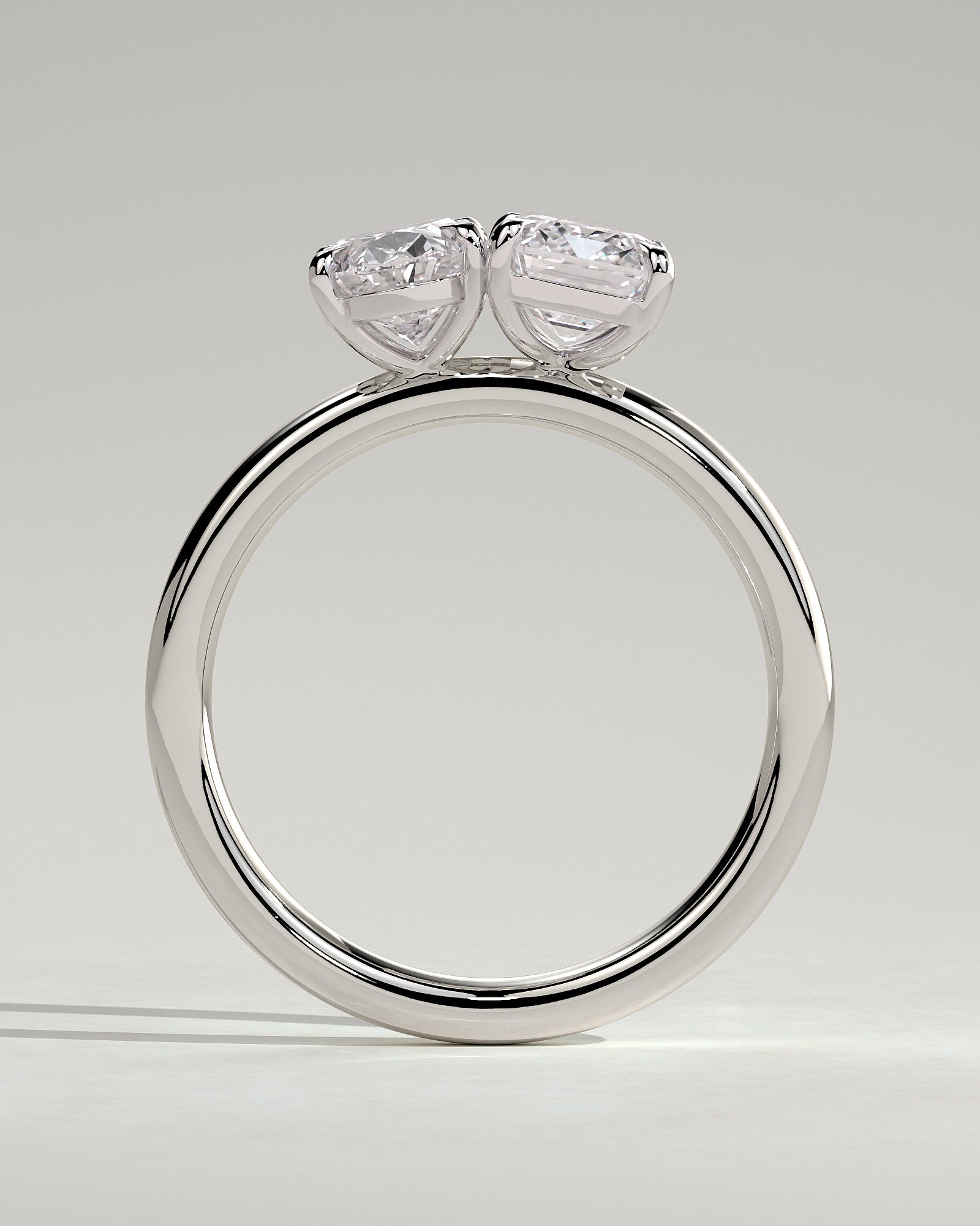 White :: close up oval and emerald lab grown diamond toi et moi ring white gold brilliant contrast