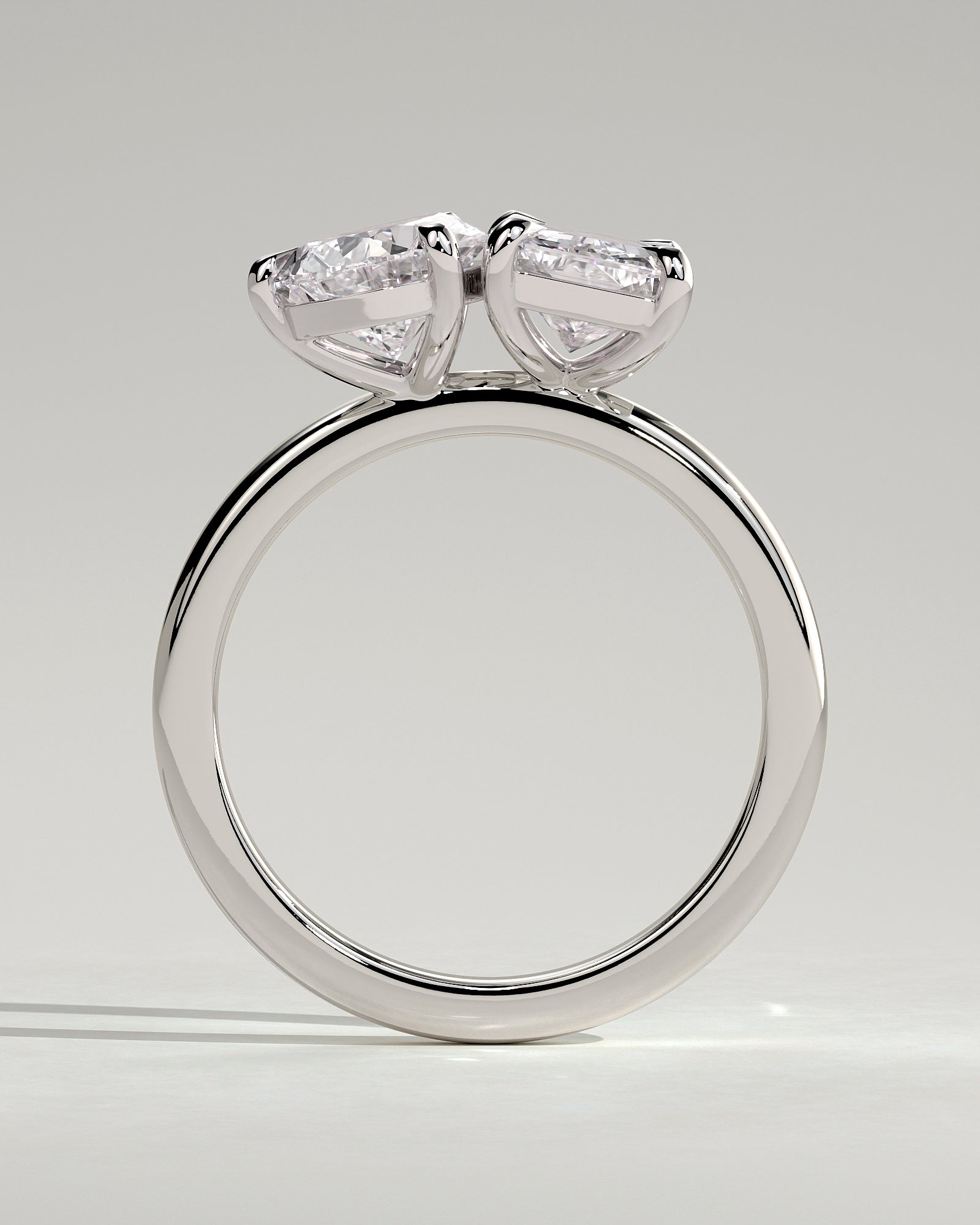 White :: close up 1.5ct pear and radiant lab grown diamond toi et moi ring white gold brilliant contrast