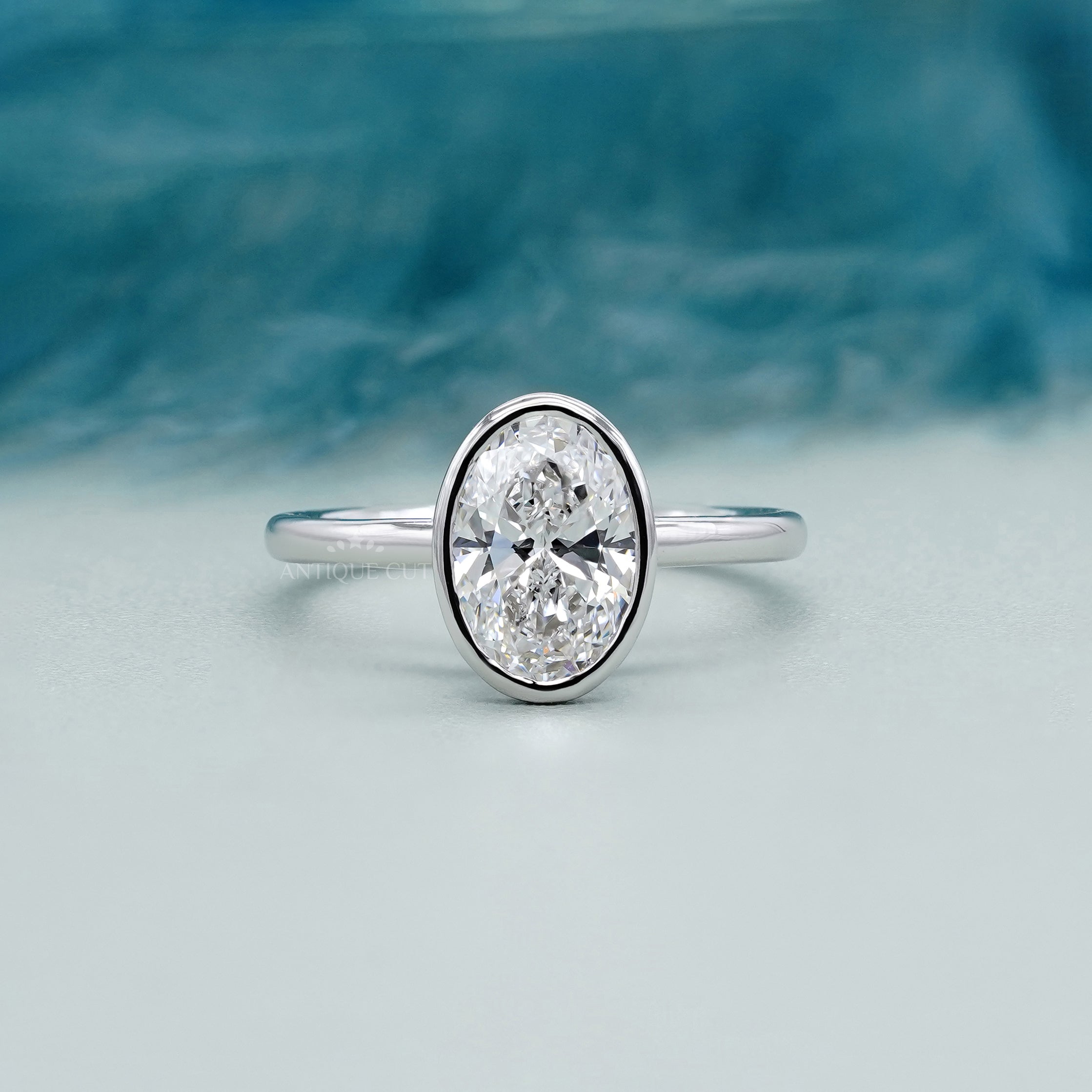 Oval 2.00ct Bezel Set Lab-Grown Diamond Solitaire Engagement Ring | White Gold | IGI Certified