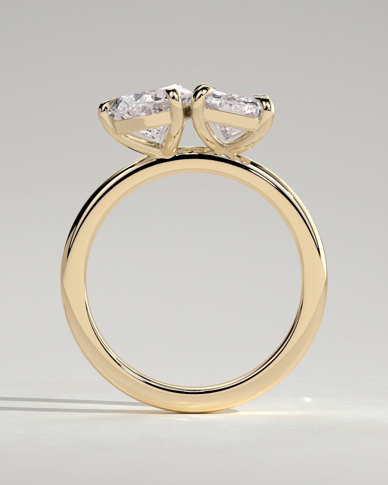 Yellow :: close up 1.5ct pear and radiant lab diamond toi et moi ring yellow gold brilliant contrast