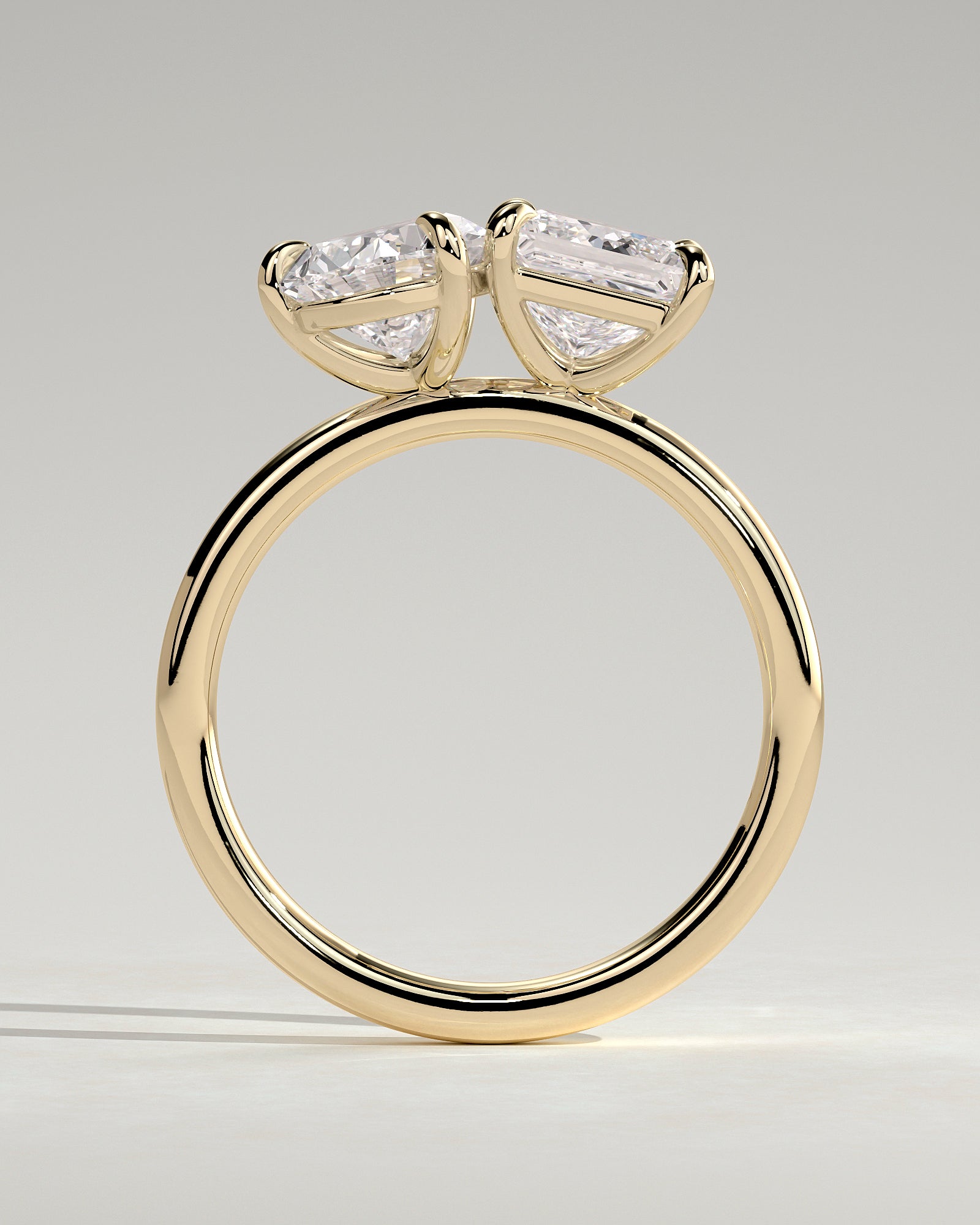 Yellow :: close up pear and princess lab diamond toi et moi ring yellow gold contrast sparkle