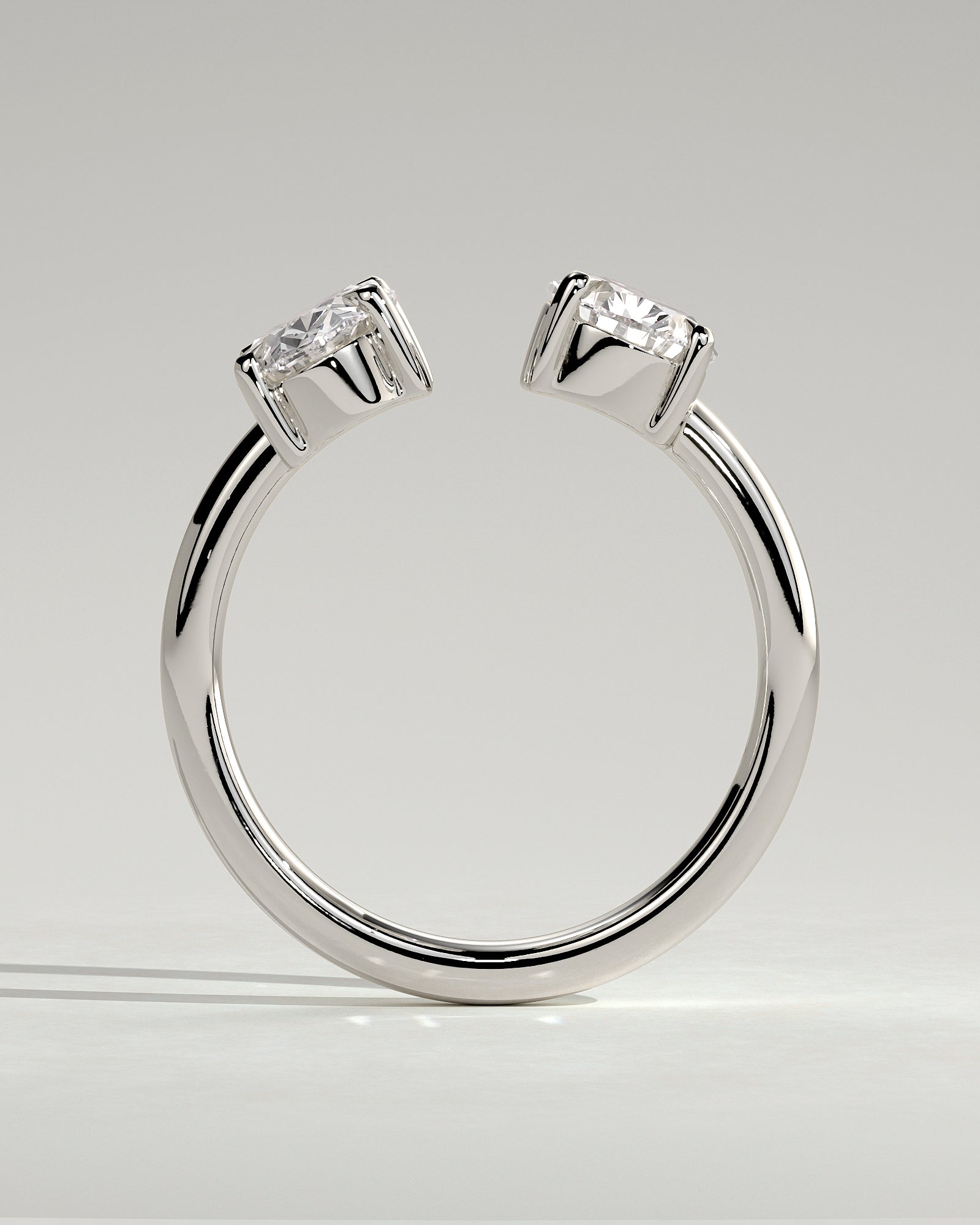 White :: close up oval and pear lab grown diamond toi et moi ring white gold brilliant contrast
