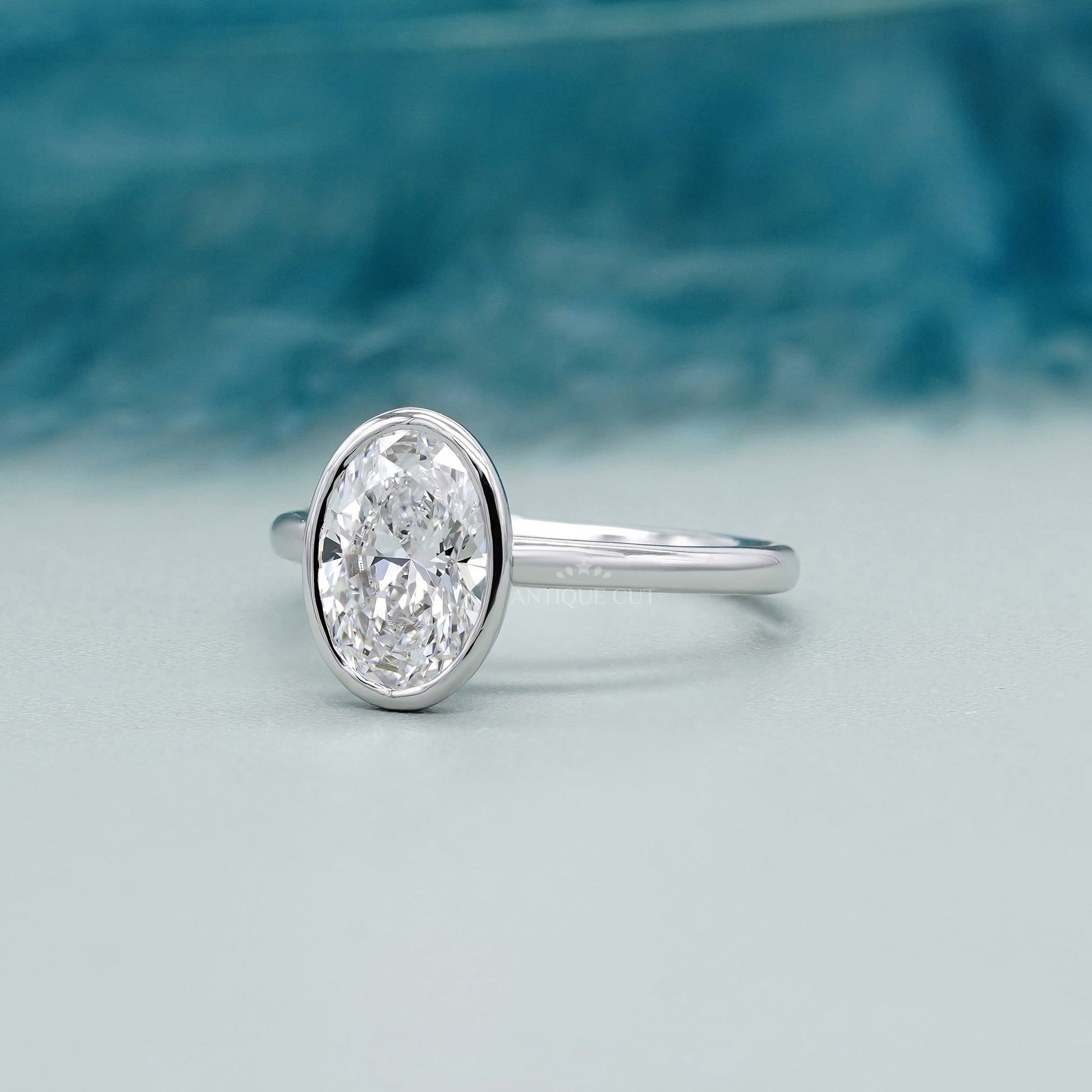 Oval 2.00ct Bezel Set Lab-Grown Diamond Solitaire Engagement Ring | White Gold | IGI Certified