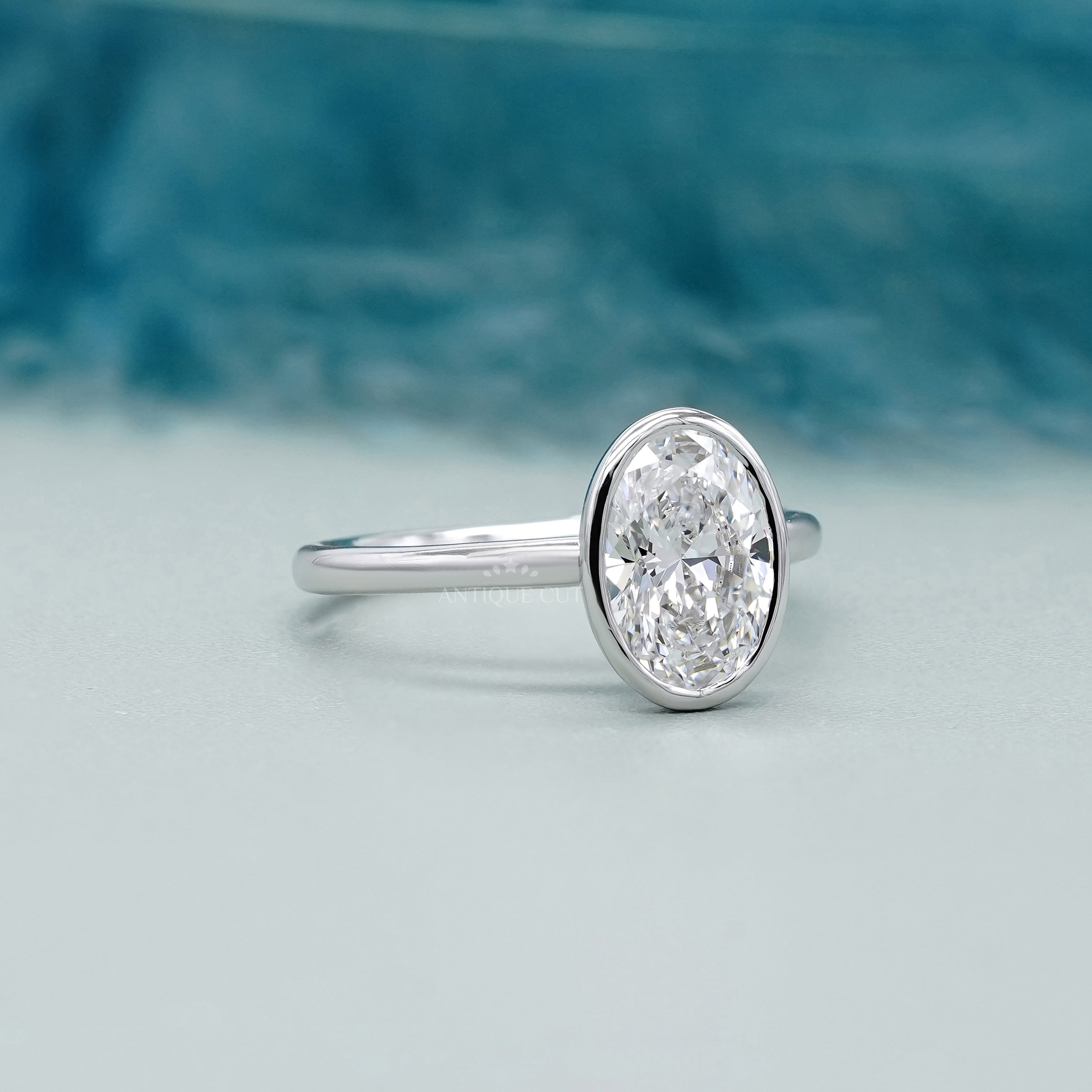 Oval 2.00ct Bezel Set Lab-Grown Diamond Solitaire Engagement Ring | White Gold | IGI Certified