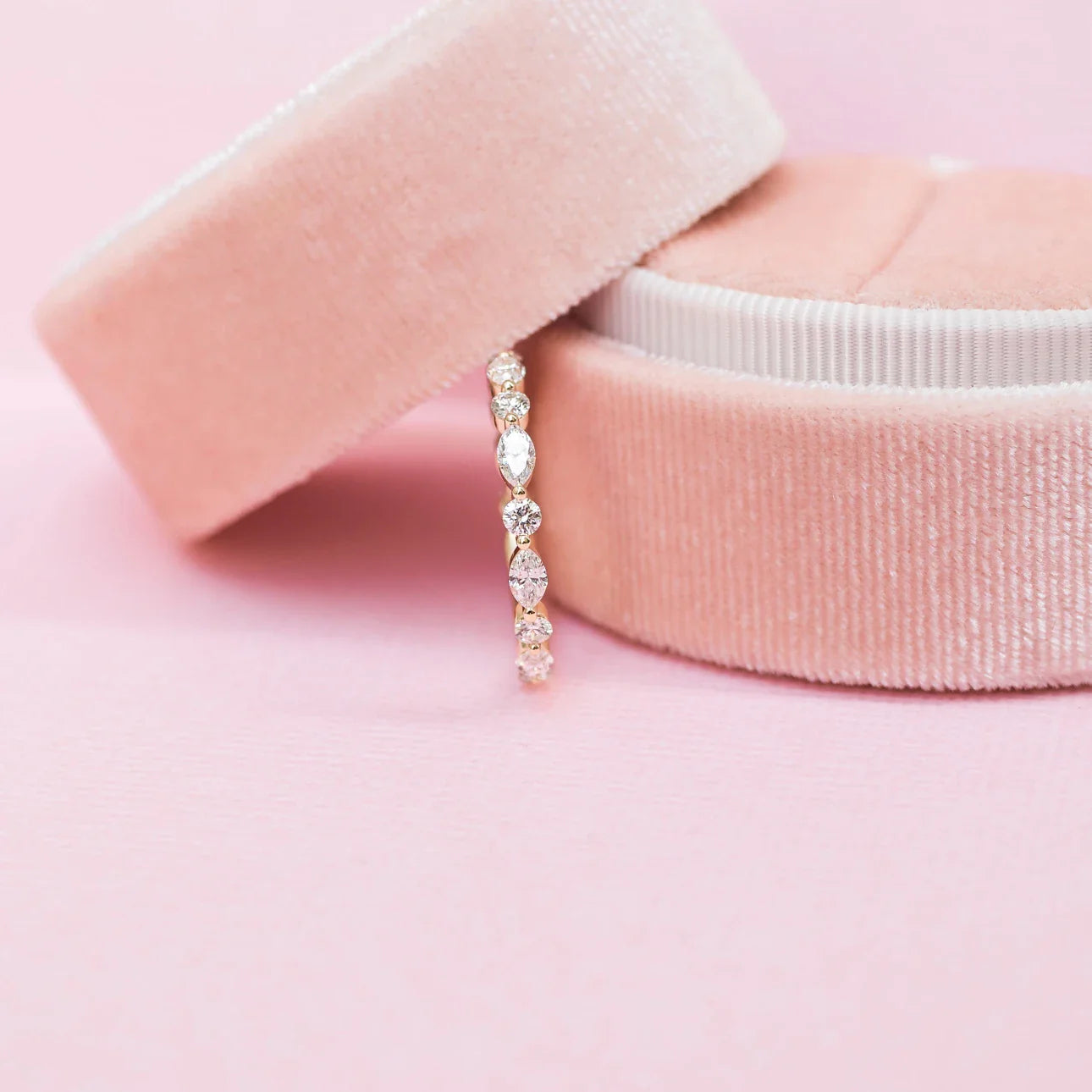 MARQUISE AND ROUND DIAMOND EAST-WEST ETERNITY BAND