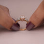 Common :: Pink marquise lab diamond ring with 0.30TCW marquise and round accent diamonds.