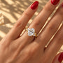 Common :: Oval diamond engagement ring with leaf inspired Marquise accents