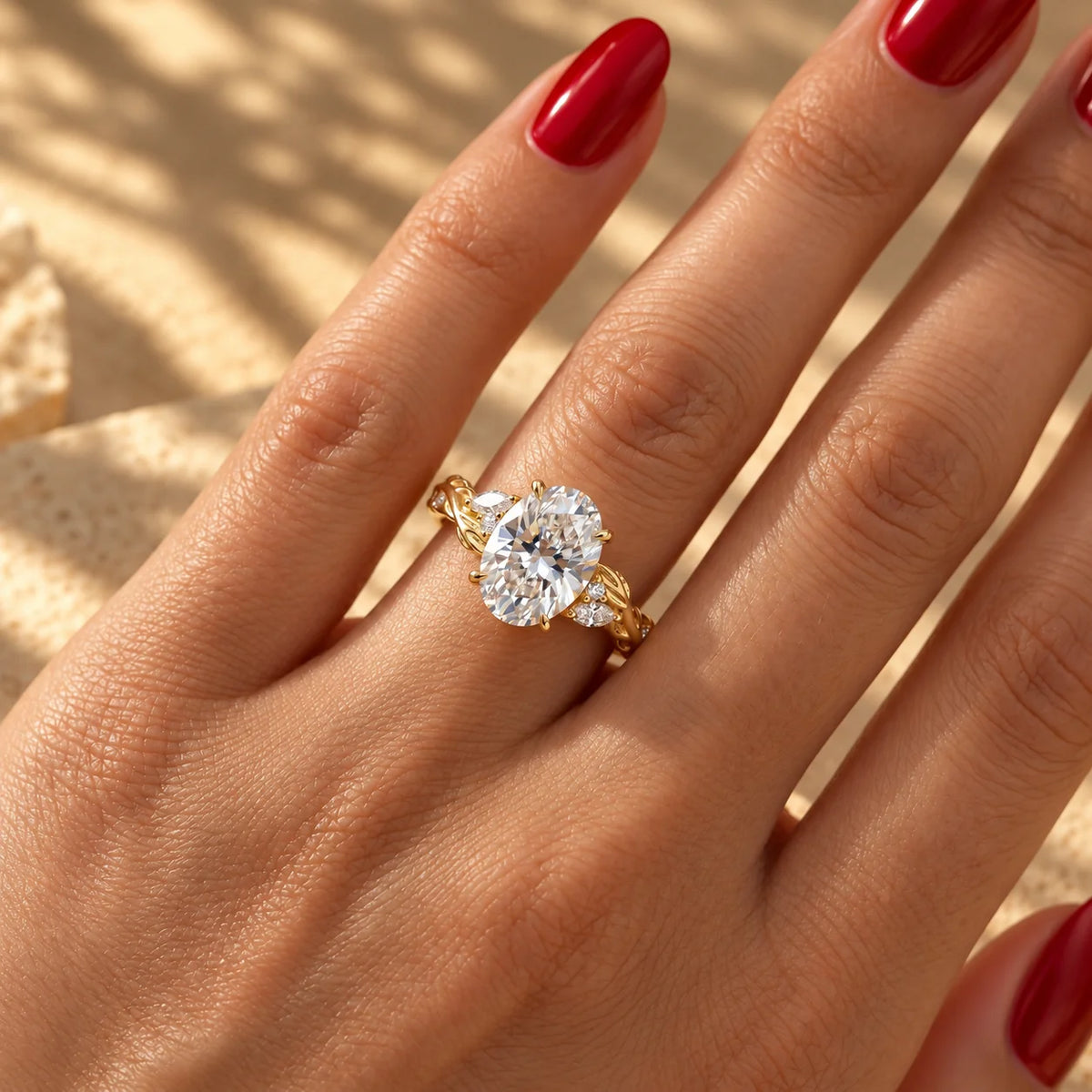 Common :: Oval diamond engagement ring with leaf inspired Marquise accents