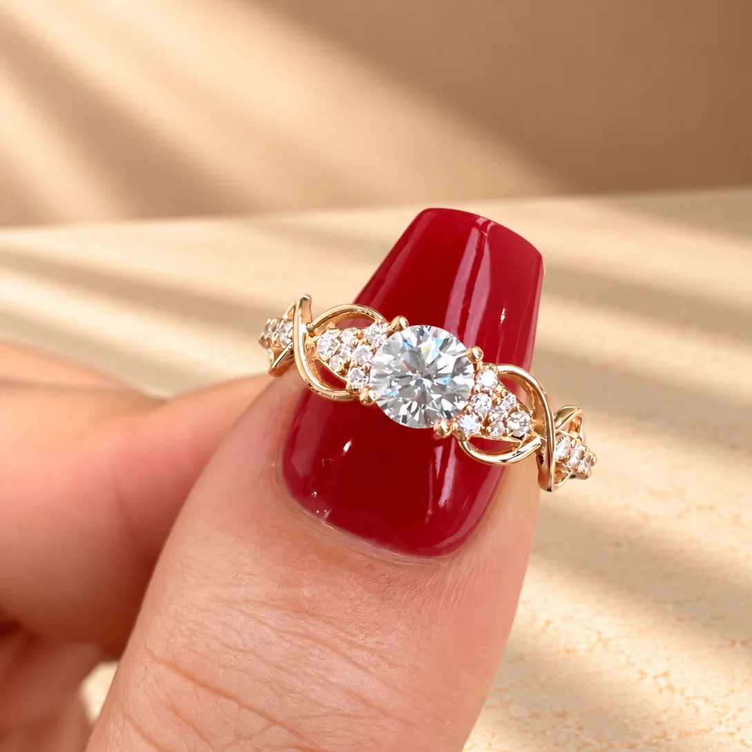 Common :: 1.40TCW round lab grown diamond nature-inspired engagement ring with round accent diamonds.