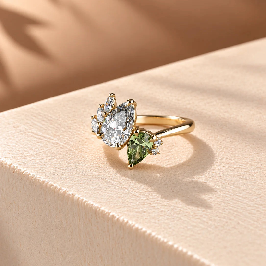 Common :: 1.50ct Pear and 1.00ct Green Pear lab grown diamond ring