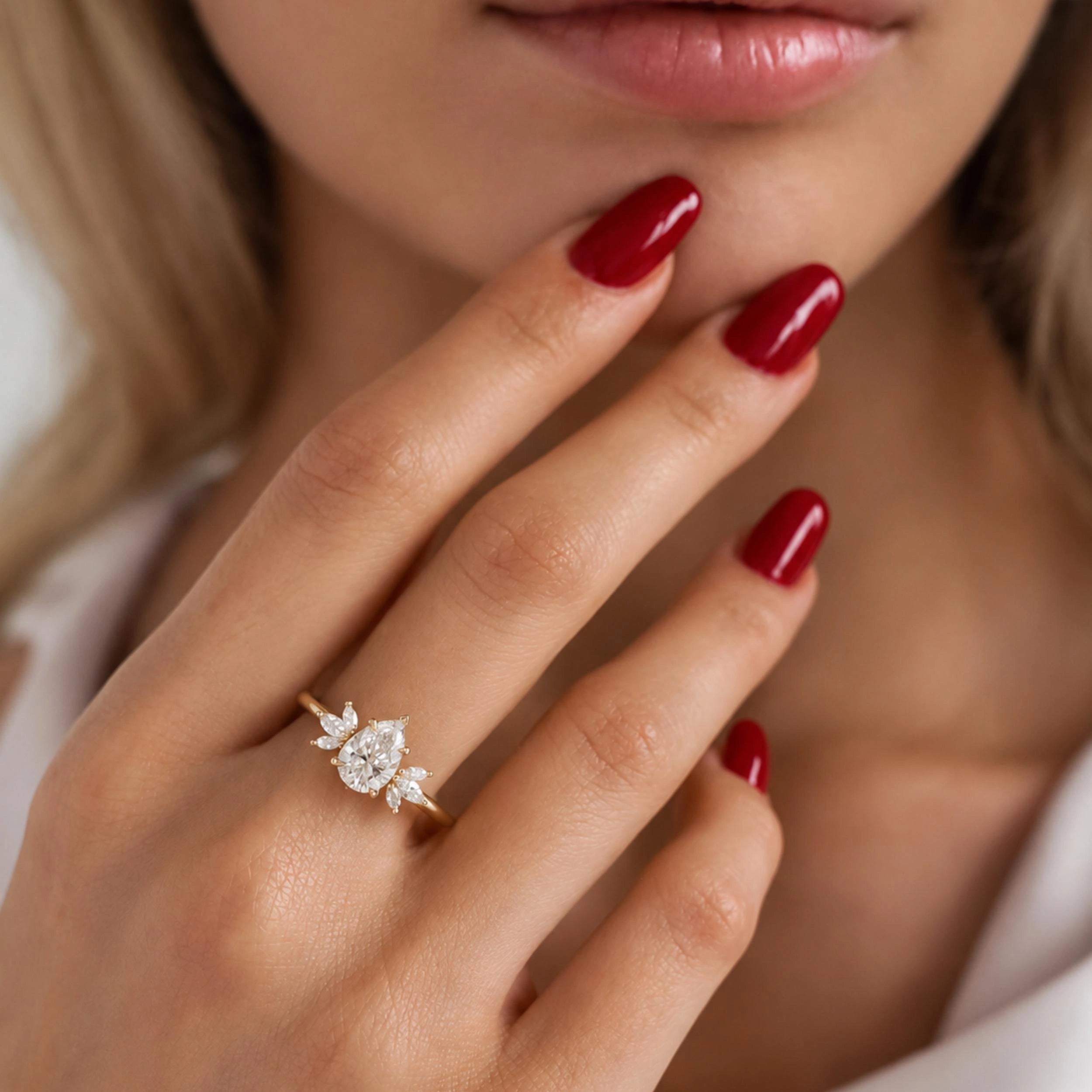 Common :: 1.50ct Pear lab grown diamond ring with Marquise diamond accents