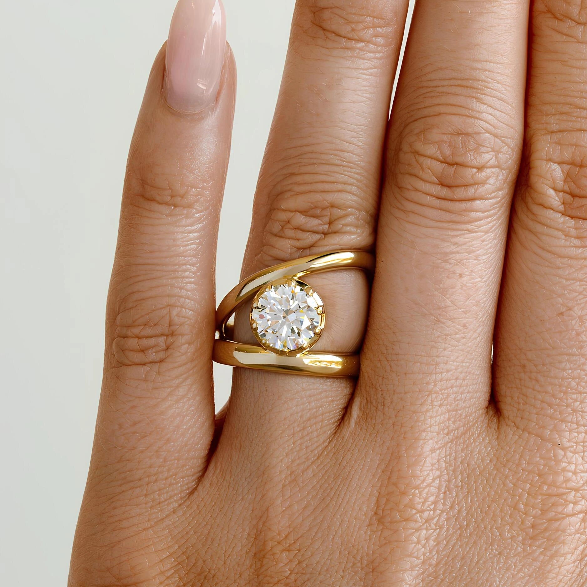 Common :: 1.80ct Round diamond solitaire ring with sculptural sweeping band