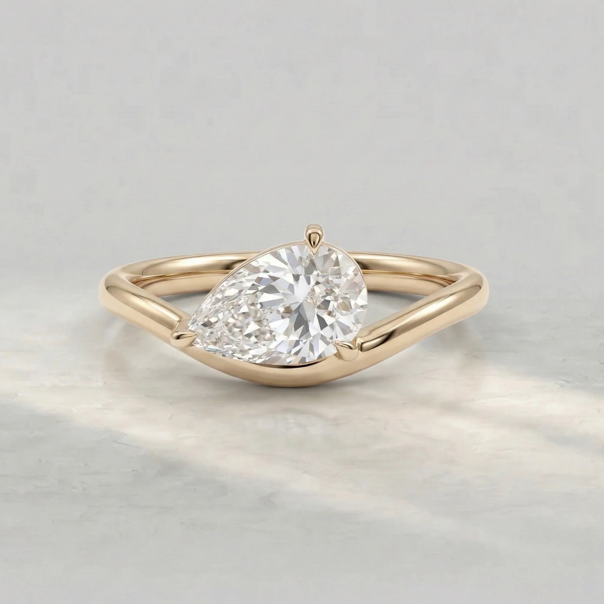Common :: Pear shaped lab grown diamond solitaire engagement ring
