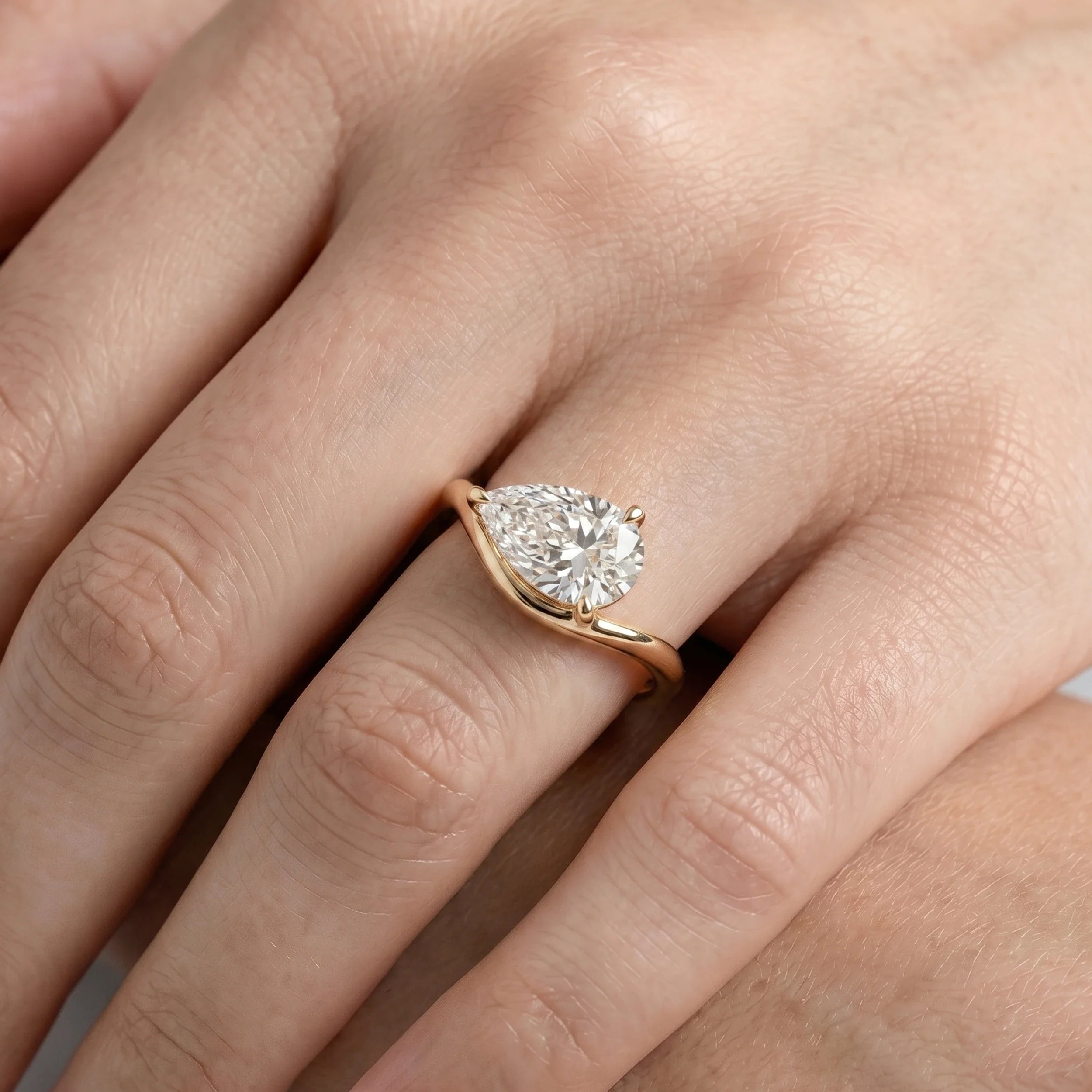 Common :: 1.33ct pear shaped lab grown diamond engagement ring with 2mm band