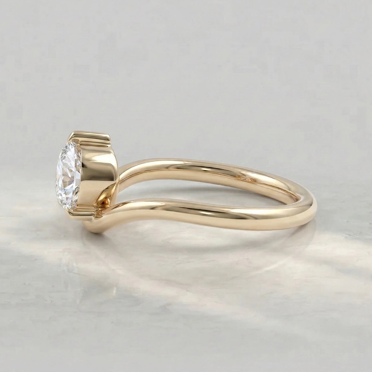 Common :: Elegant pear diamond engagement ring with refined 2mm band