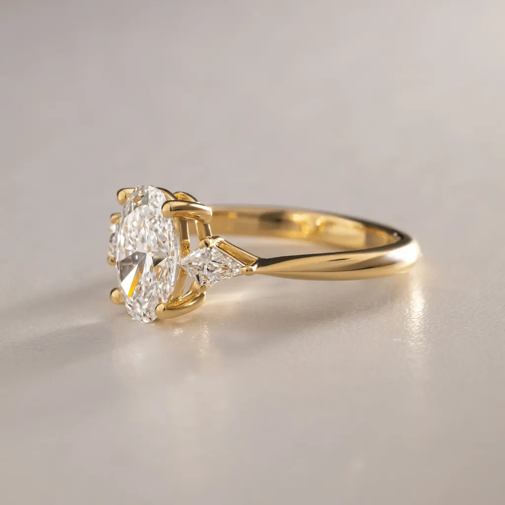 Common :: IGI certified oval diamond engagement ring with kite side stones