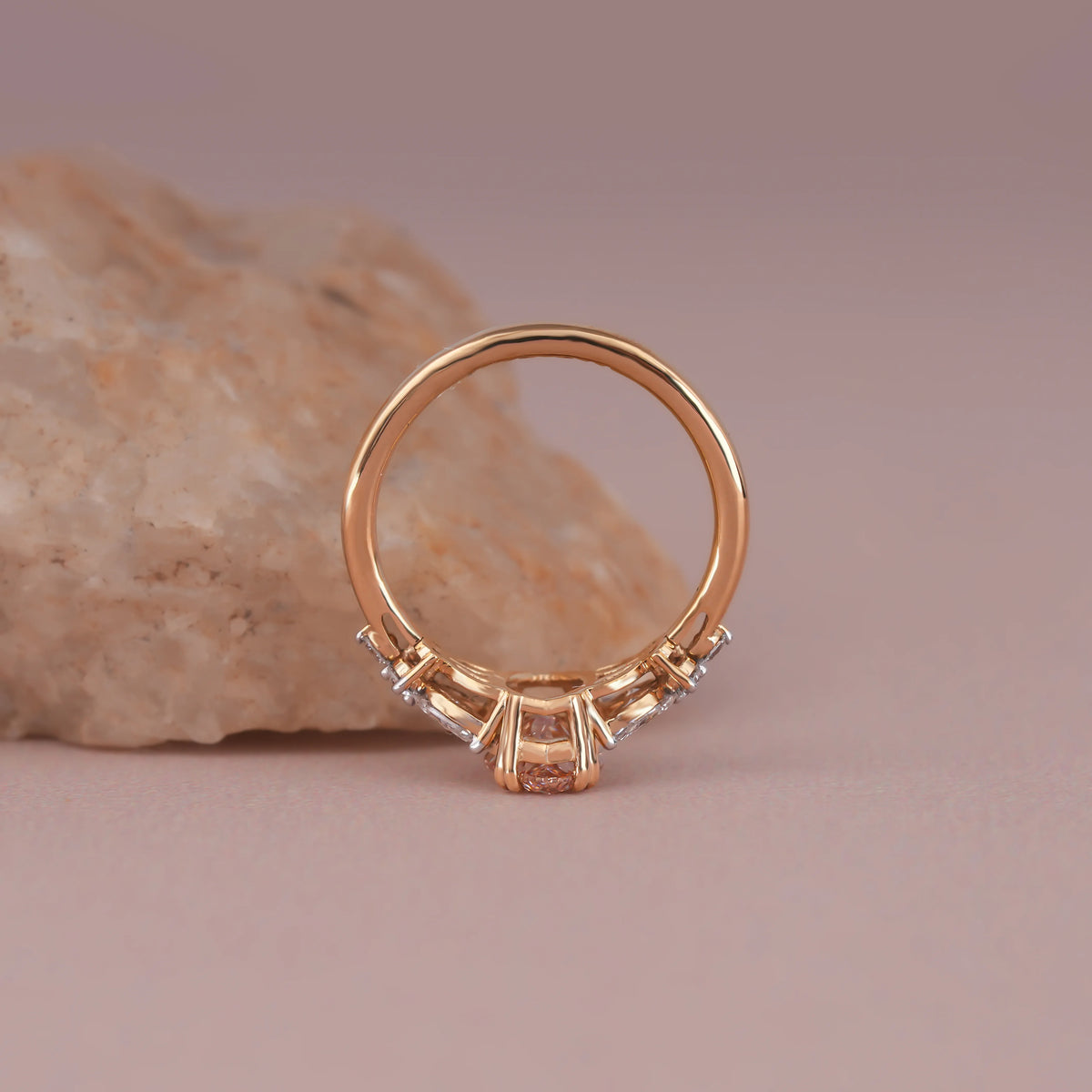Common :: Close-up of a 1.30TCW pink marquise lab grown diamond engagement ring featuring a nature-inspired design and delicate diamond accents.