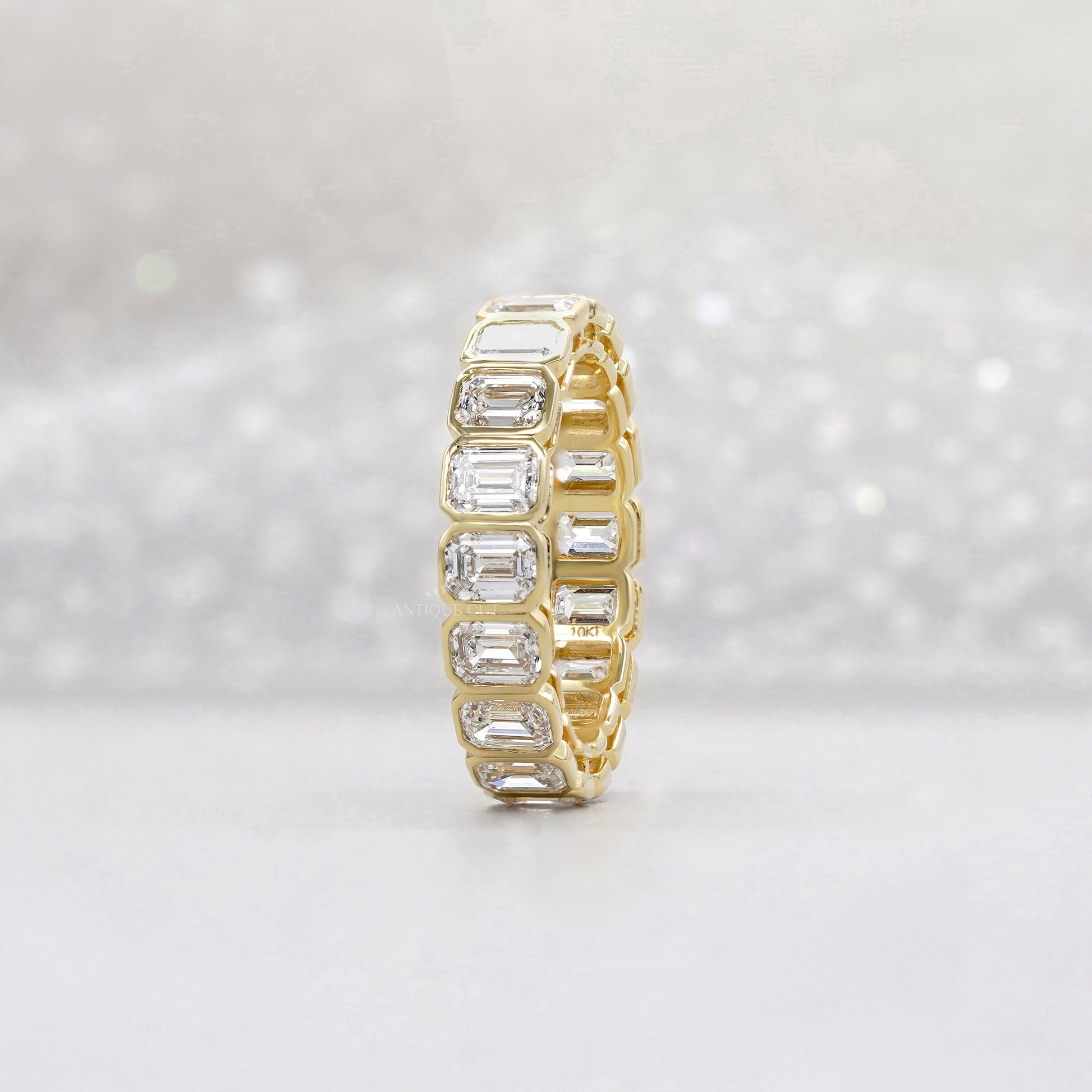 Emerald Cut 3.60tcw Lab Diamond Eternity Band | IGI Certified | Yellow Gold