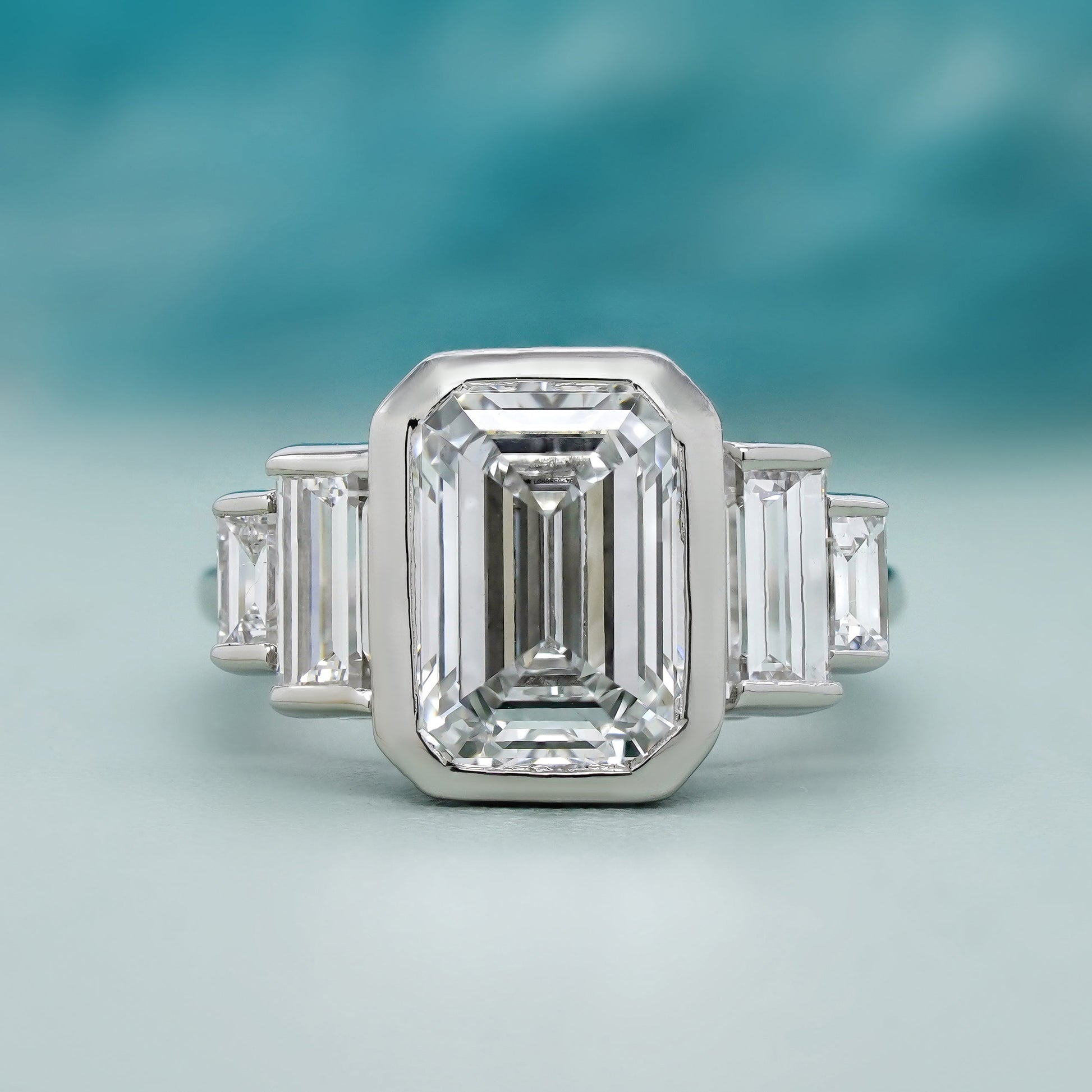 Emerald 4.00tcw Lab Grown Diamond, Bezel Set Three Stone Engagement Ring, D-E-F Color, VVS-VS Clarity, IGI Certificate