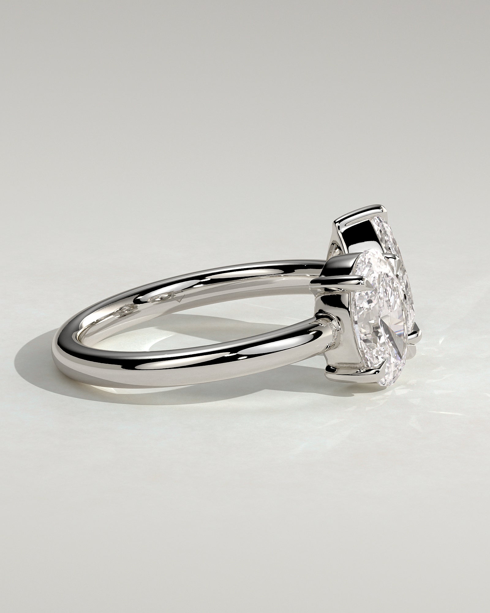 White :: elegant oval pear lab grown diamond toi et moi ring white gold sleek style