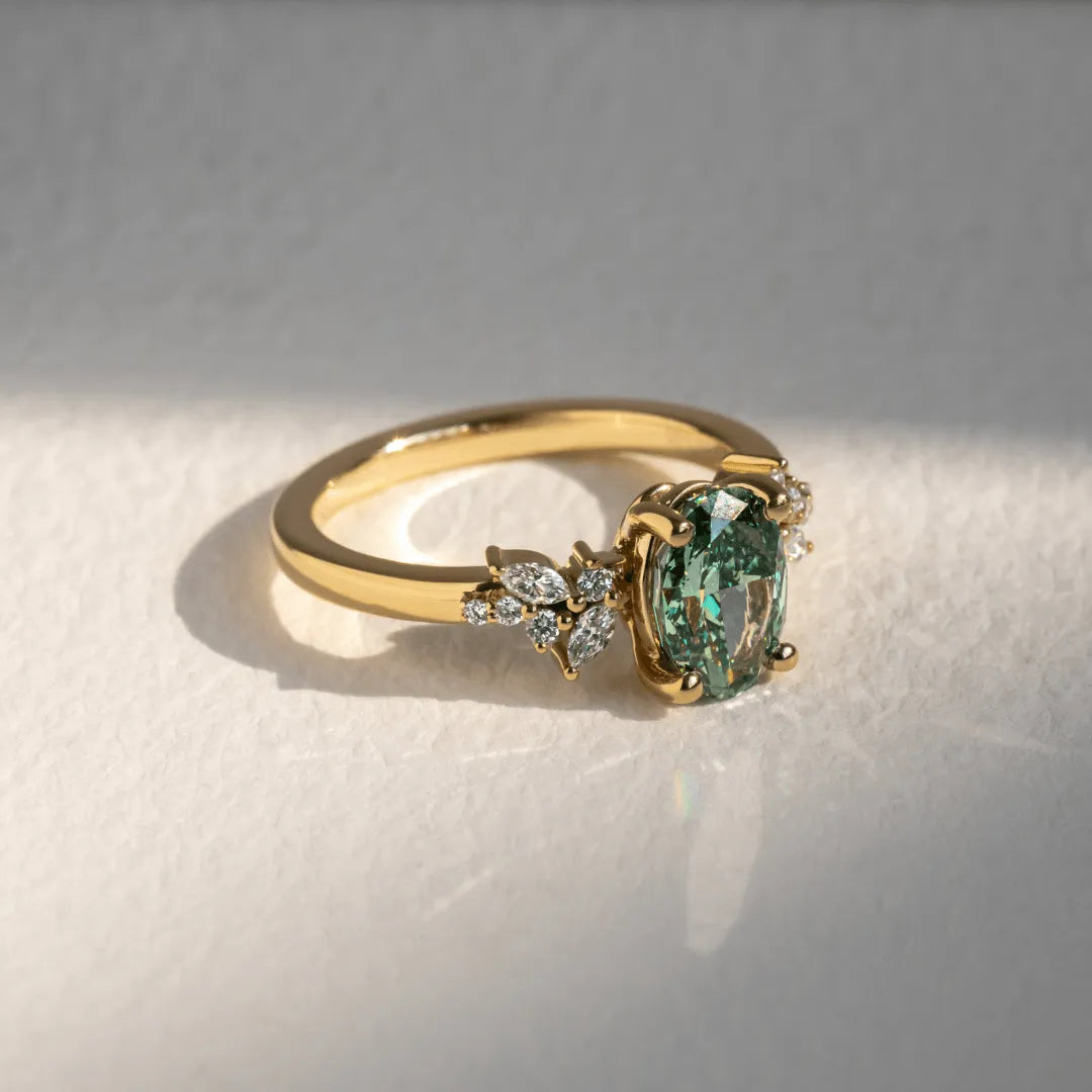 Common :: fancy green oval diamond ring cluster setting IGI certified