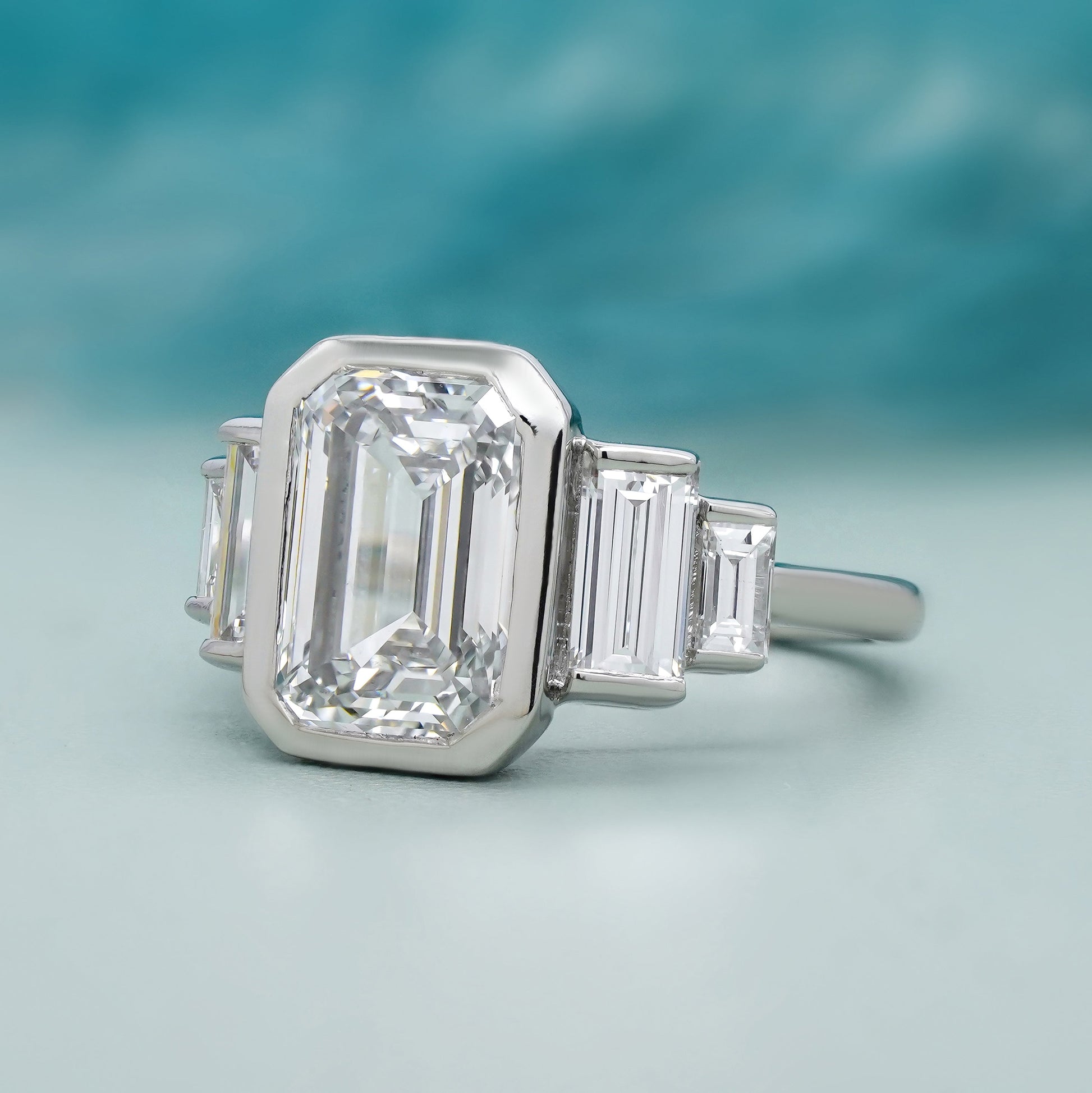 Emerald 4.00tcw Lab Grown Diamond, Bezel Set Three Stone Engagement Ring, D-E-F Color, VVS-VS Clarity, IGI Certificate