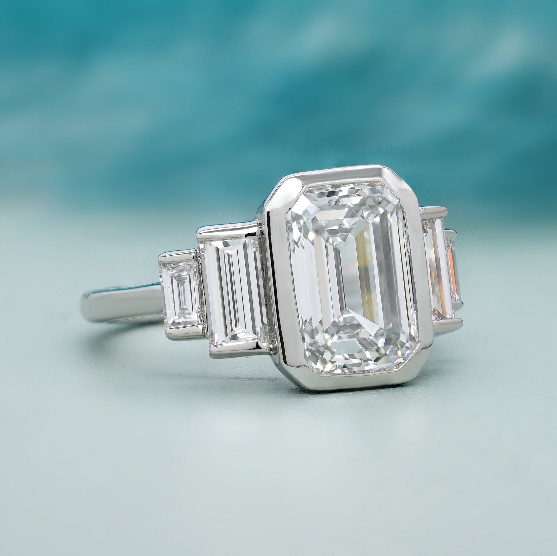 Emerald 4.00tcw Lab Grown Diamond, Bezel Set Three Stone Engagement Ring, D-E-F Color, VVS-VS Clarity, IGI Certificate