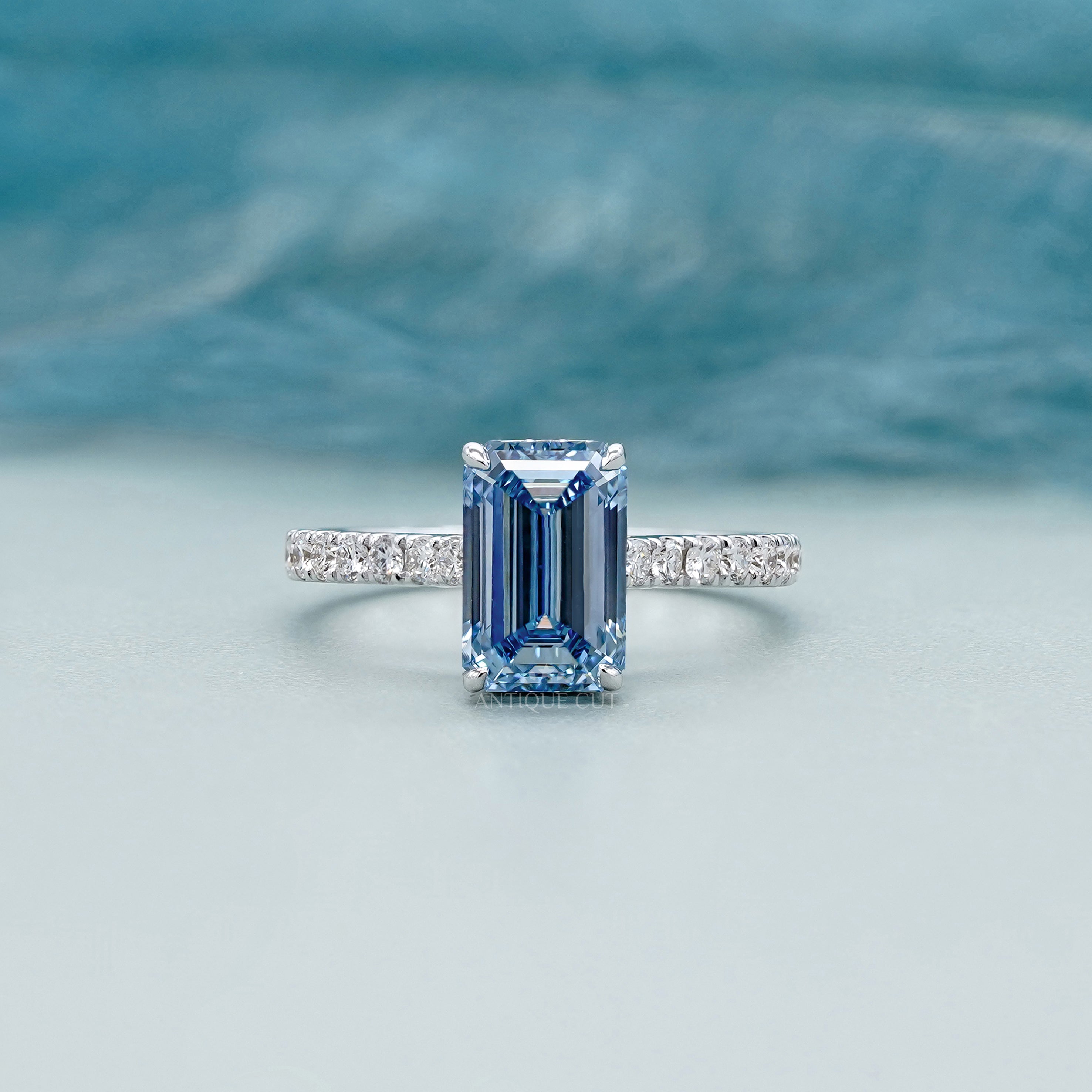Fancy Blue 2.40tcw Emerald Cut Lab Diamond Engagement Ring | IGI Certified | White Gold Pave Setting