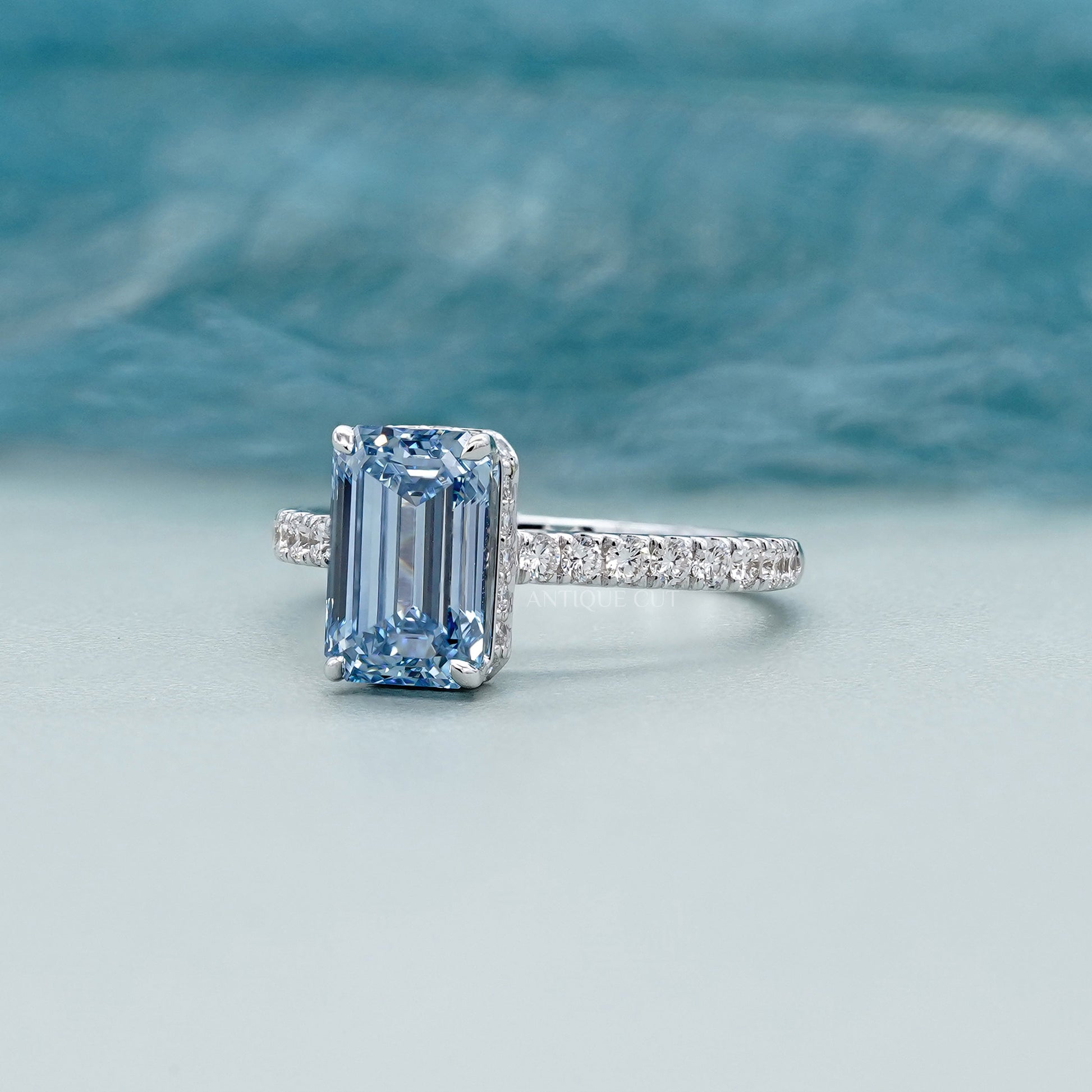 Fancy Blue 2.40tcw Emerald Cut Lab Diamond Engagement Ring | IGI Certified | White Gold Pave Setting