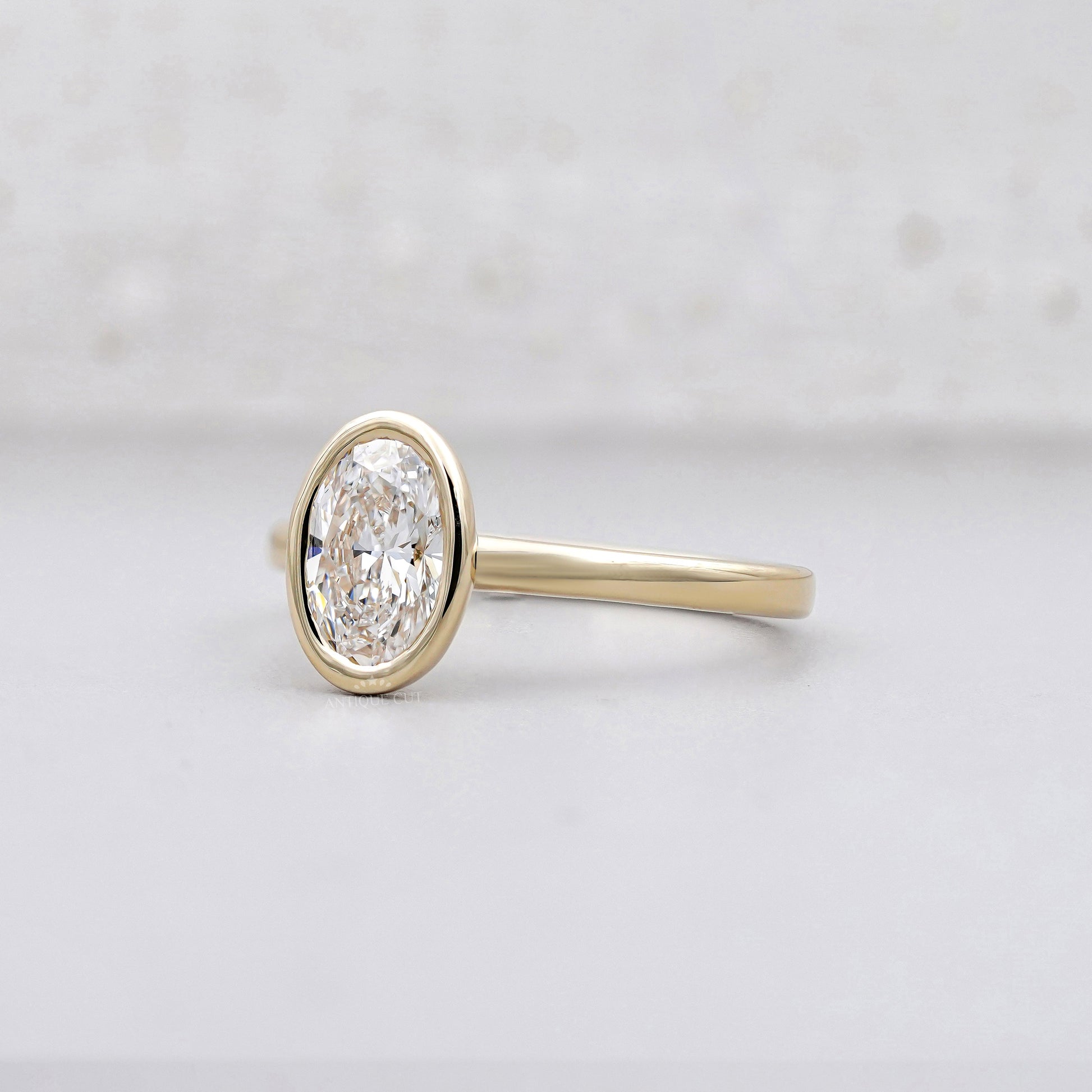1.50ct Oval Cut Diamond Ring | Bezel Set Solitaire | 14K Yellow Gold | Minimalist Engagement Ring | Unii Jewels Fine Jewelry