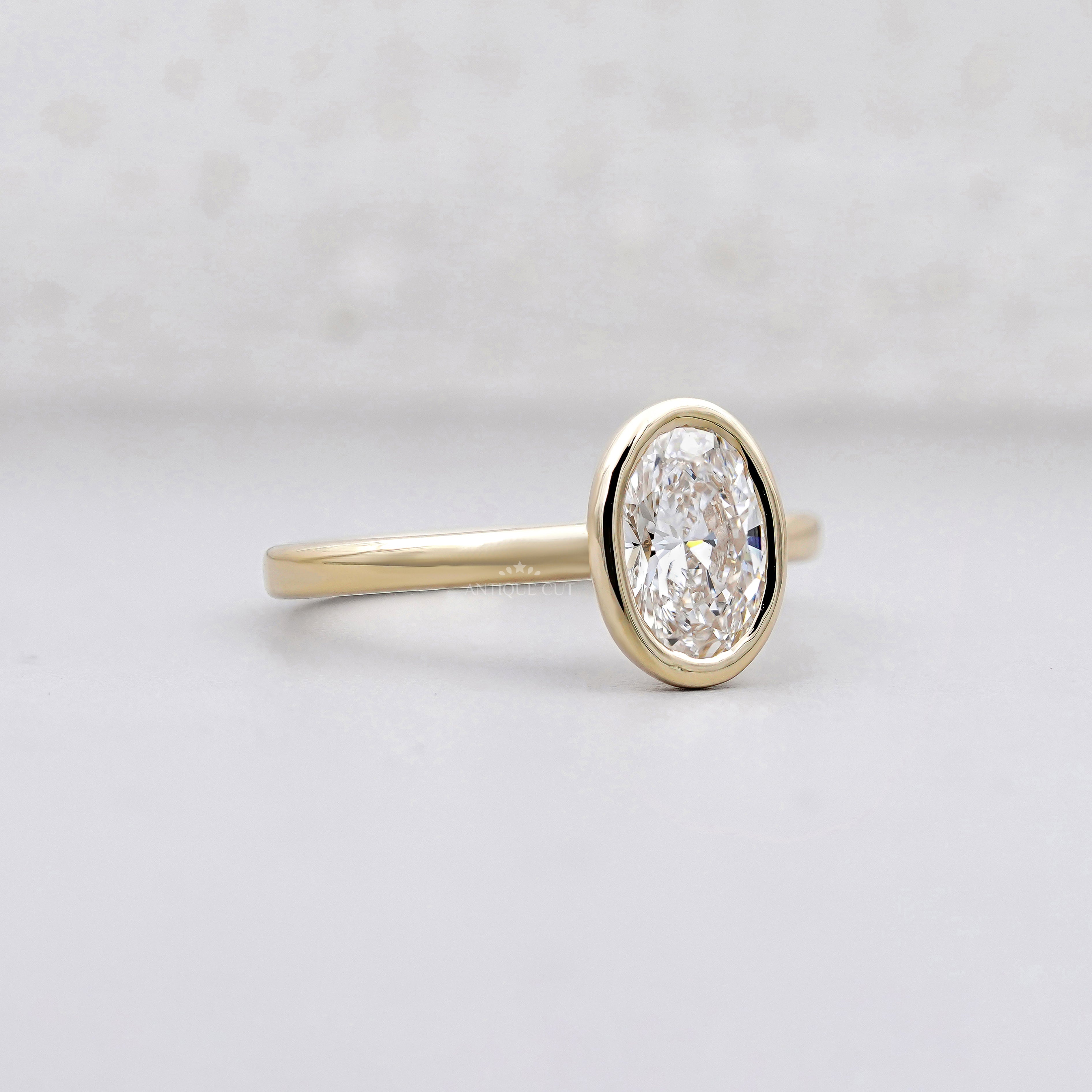 1.50ct Oval Cut Diamond Ring | Bezel Set Solitaire | 14K Yellow Gold | Minimalist Engagement Ring | Unii Jewels Fine Jewelry