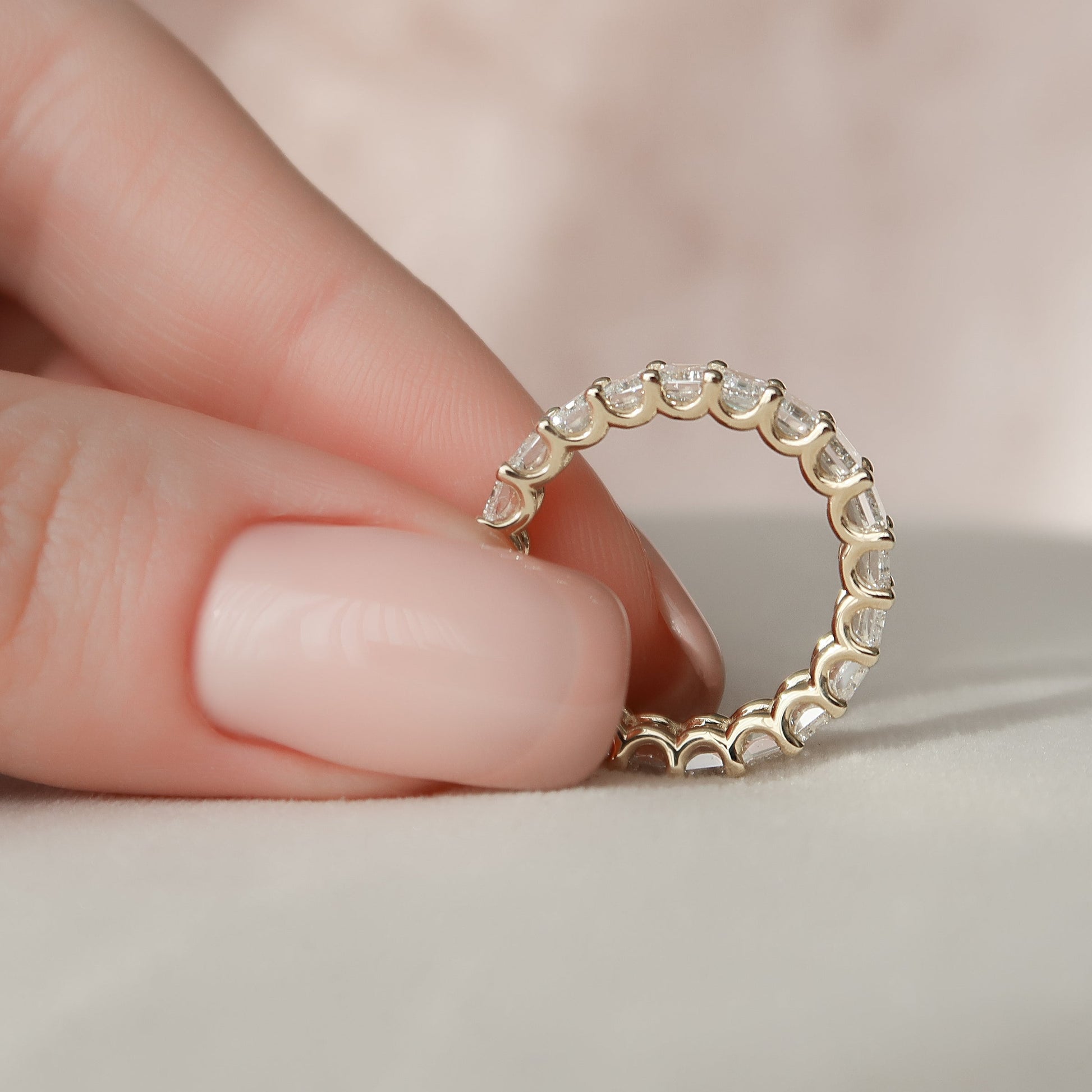 Yellow :: close up 4ct emerald u prong lab diamond eternity ring yellow gold step cut brilliance
