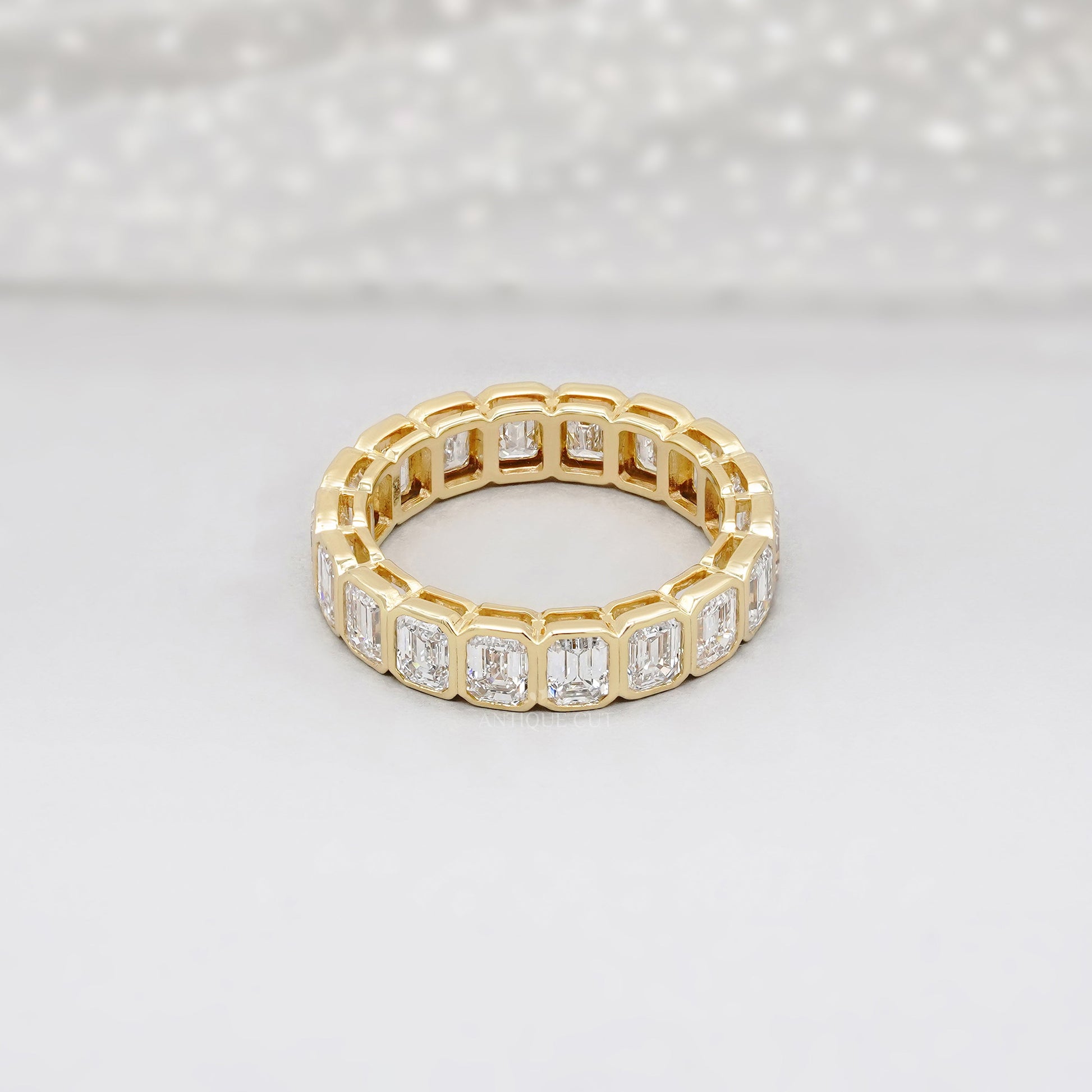 Emerald Cut 3.60tcw Lab Diamond Eternity Band | IGI Certified | Yellow Gold