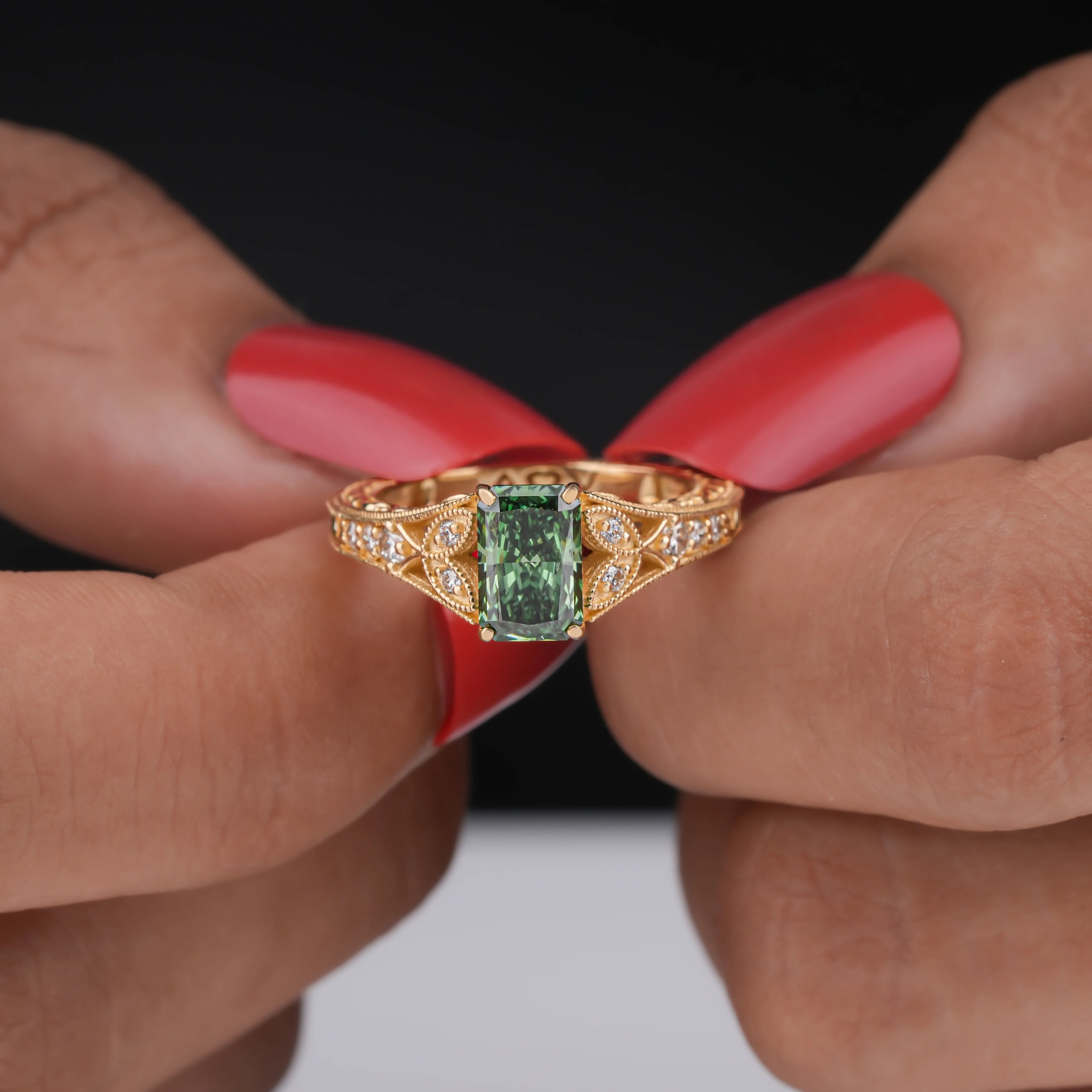 Common :: 1.00CT green radiant-cut lab grown diamond ring with IGI-certified center stone.