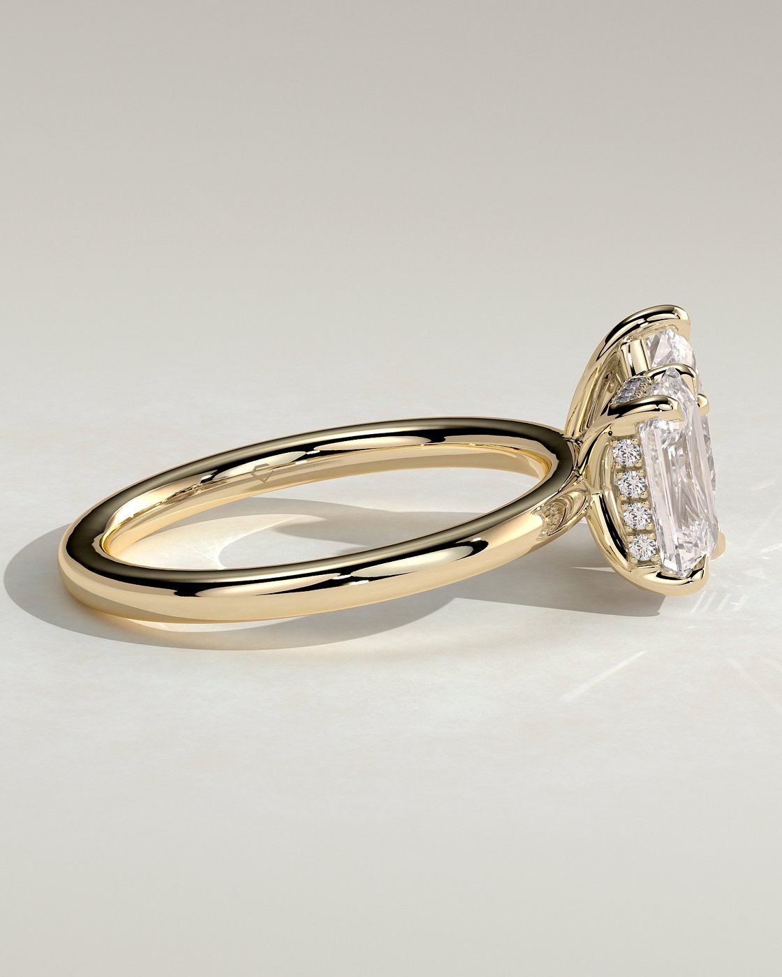 Yellow :: premium emerald pear hidden halo ring yellow gold luxury style