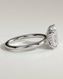 White :: close up emerald and pear hidden halo lab grown diamond ring white gold brilliant contrast